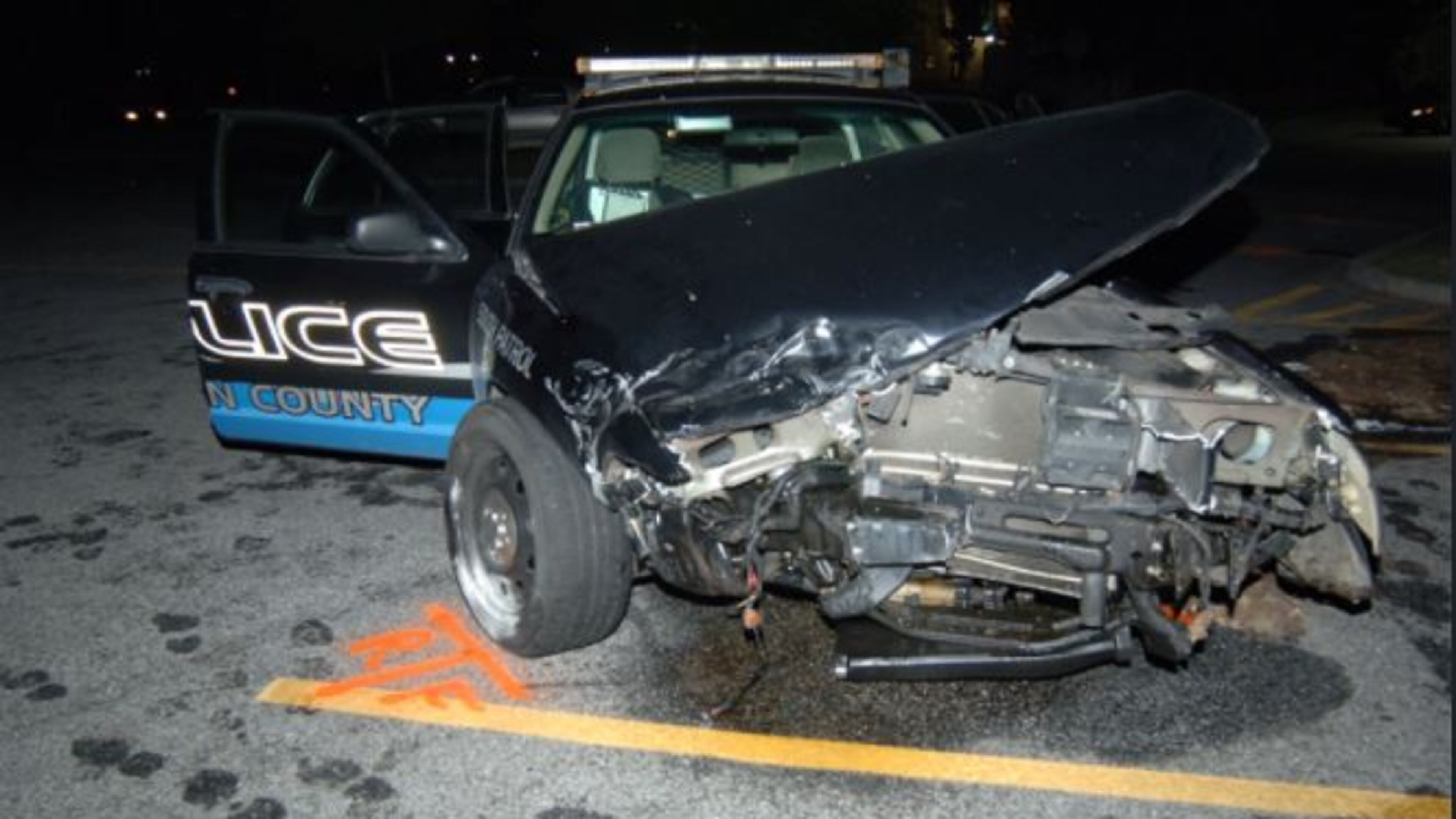 A Fulton County police car crashed with a suspect inside.