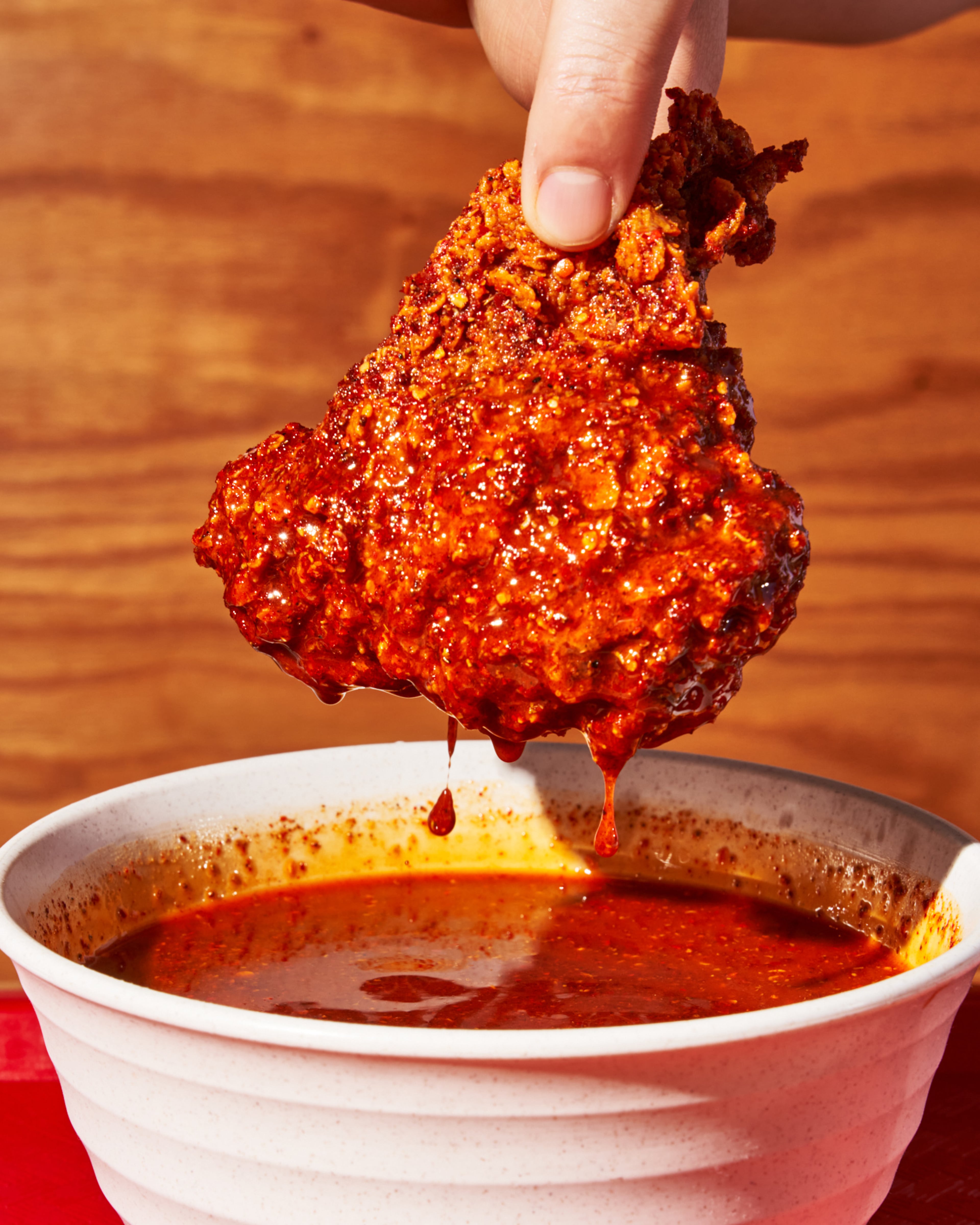 The chile fried chicken from New York’s Pecking House is buttermilk-brined, country-fried and finished with Sichuan peppercorns, Tianjin chiles and five-spice. (Courtesy of Adam Friedlander)