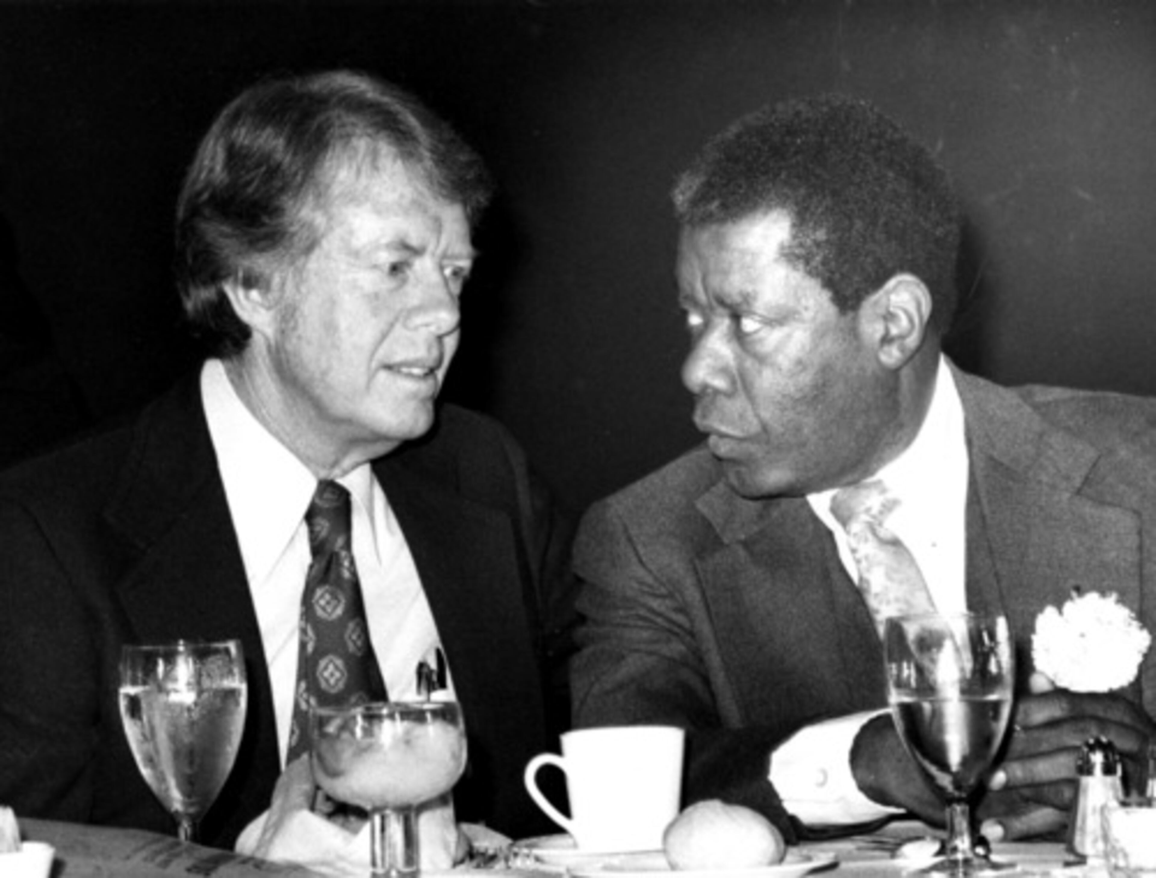 Hill shares the spotlight with presidential candidate Jimmy Carter in 1976. Hill often advised students as they spun plans for demonstrations or political actions. He also organized successful voter registration drives in Atlanta throughout the late 1960s and 1970s.