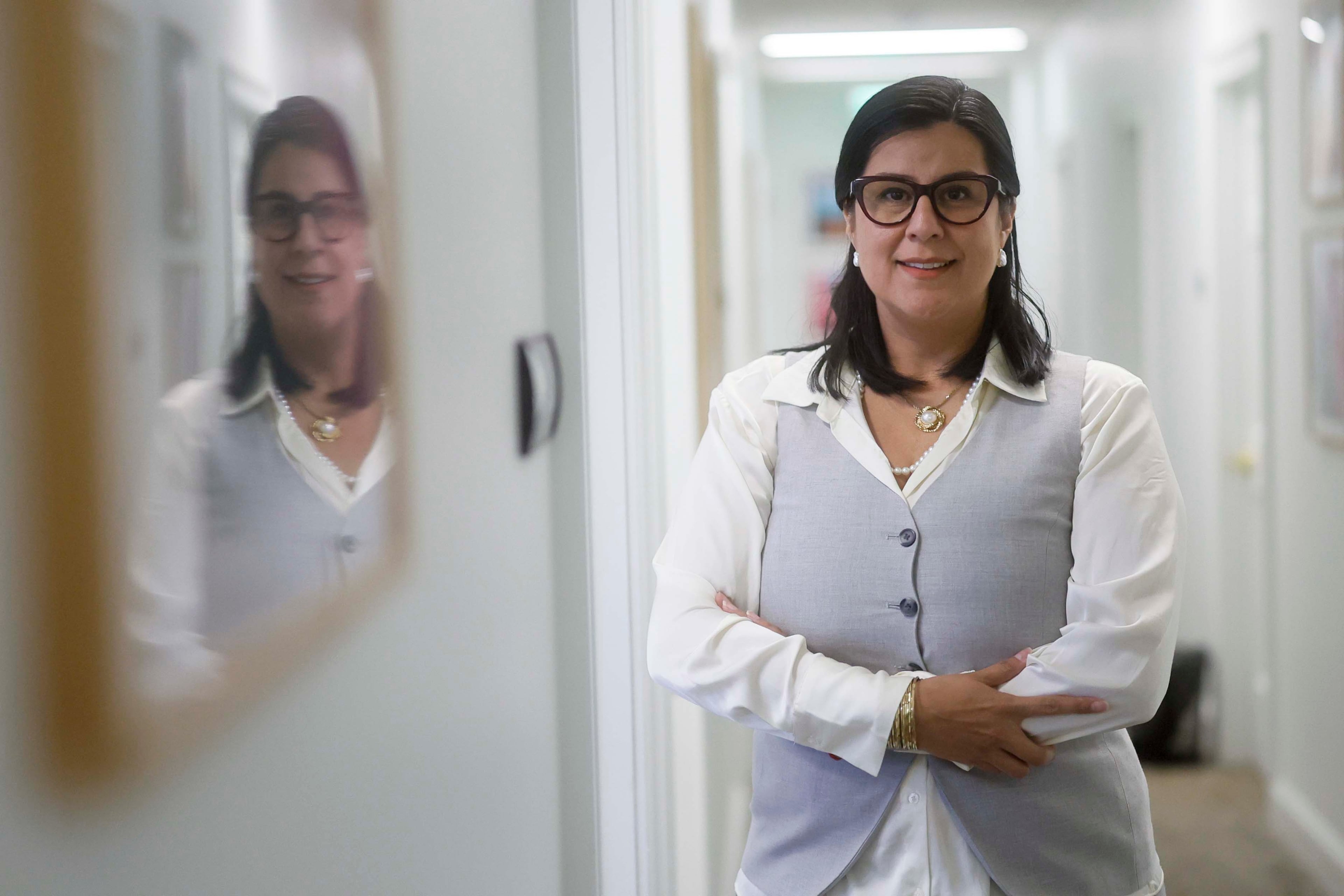 Licensed therapist Lucero Morse is planning to vote for Keisha Lance Bottoms and Jon Ossoff, and says immigration is a top concern for her. (Miguel Martinez/AJC)