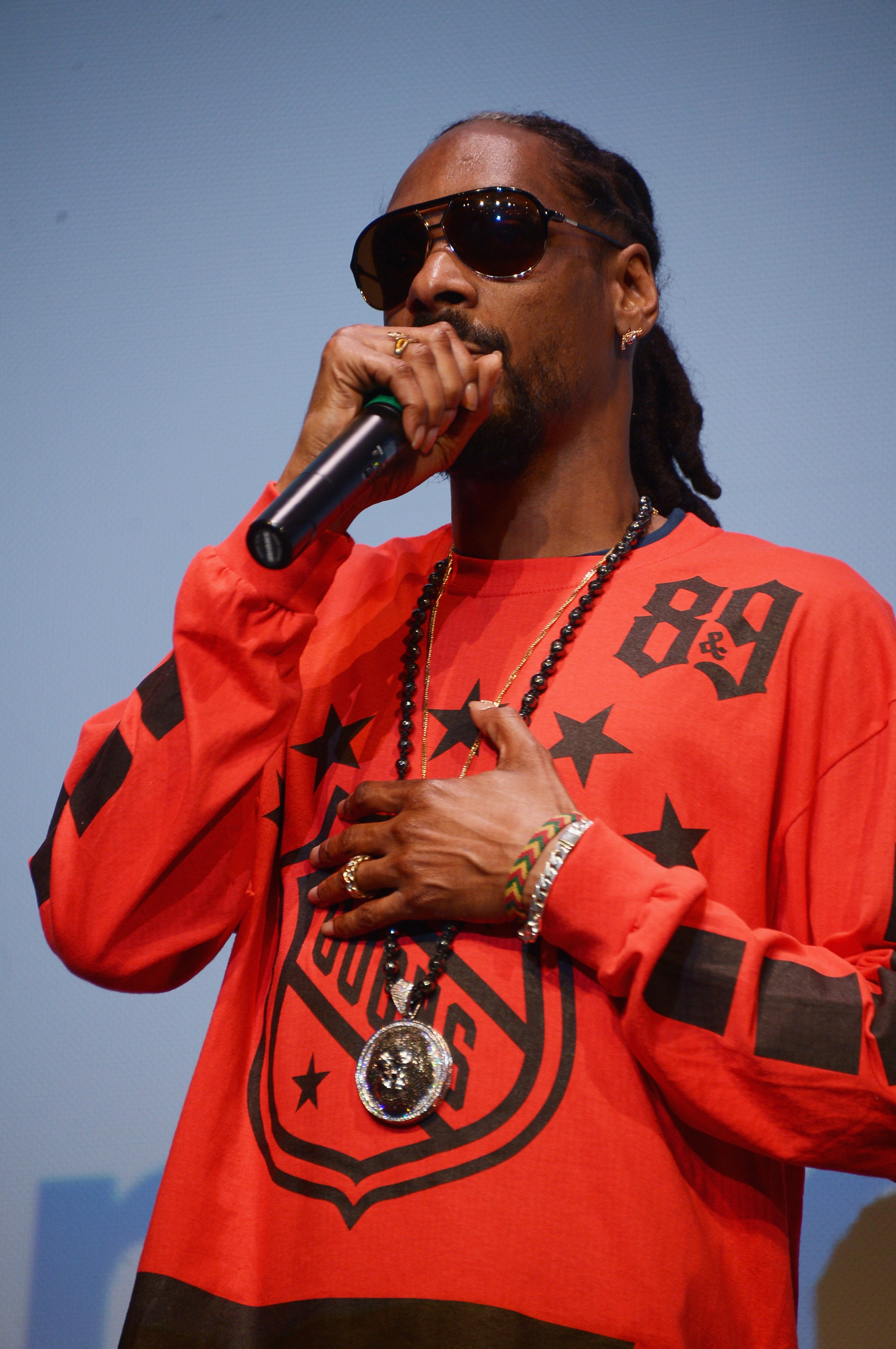 AUSTIN, TX - MARCH 11: Rapper Snoop Dogg takes part in a Q&A following the "Take Me To The River" premiere at the 2014 SXSW Music, Film + Interactive Festival at the Topfer Theatre at ZACH on March 11, 2014 in Austin, Texas. (Photo by Michael Loccisano/Getty Images for SXSW)