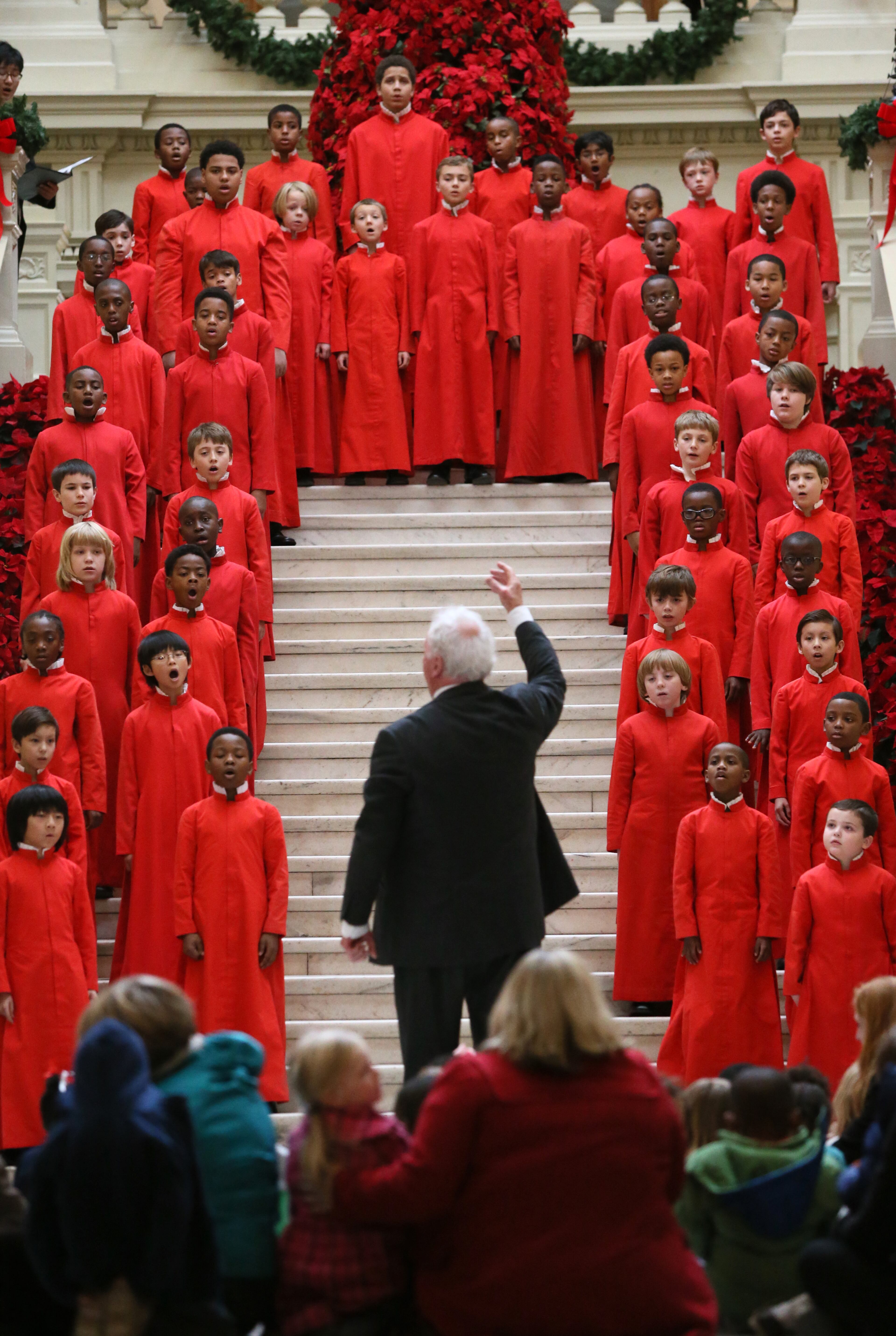 Dec. 8, 2014 - Atlanta - The Atlanta Boy Choir performs during the ceremony. Gov. Nathan Deal, first lady Sandra Deal and other state officials kick off the holiday season by taking part in the annual lighting of Christmas tree at the state Capitol on Monday, Dec. 8. The ceremony featured performances by the Atlanta Boy Choir, Alumni Men's Choir and the Parkview High School Orchestra. BOB ANDRES / BANDRES@AJC.COM