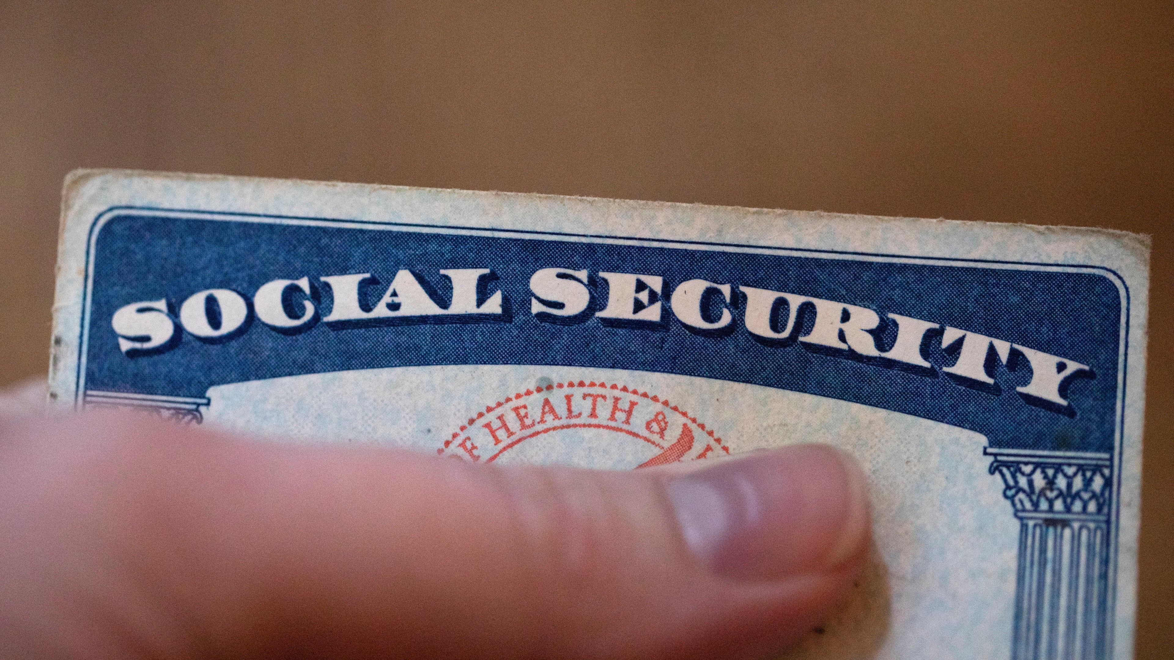 FILE - A Social Security card is displayed on Oct. 12, 2021, in Tigard, Ore. (AP Photo/Jenny Kane, File)