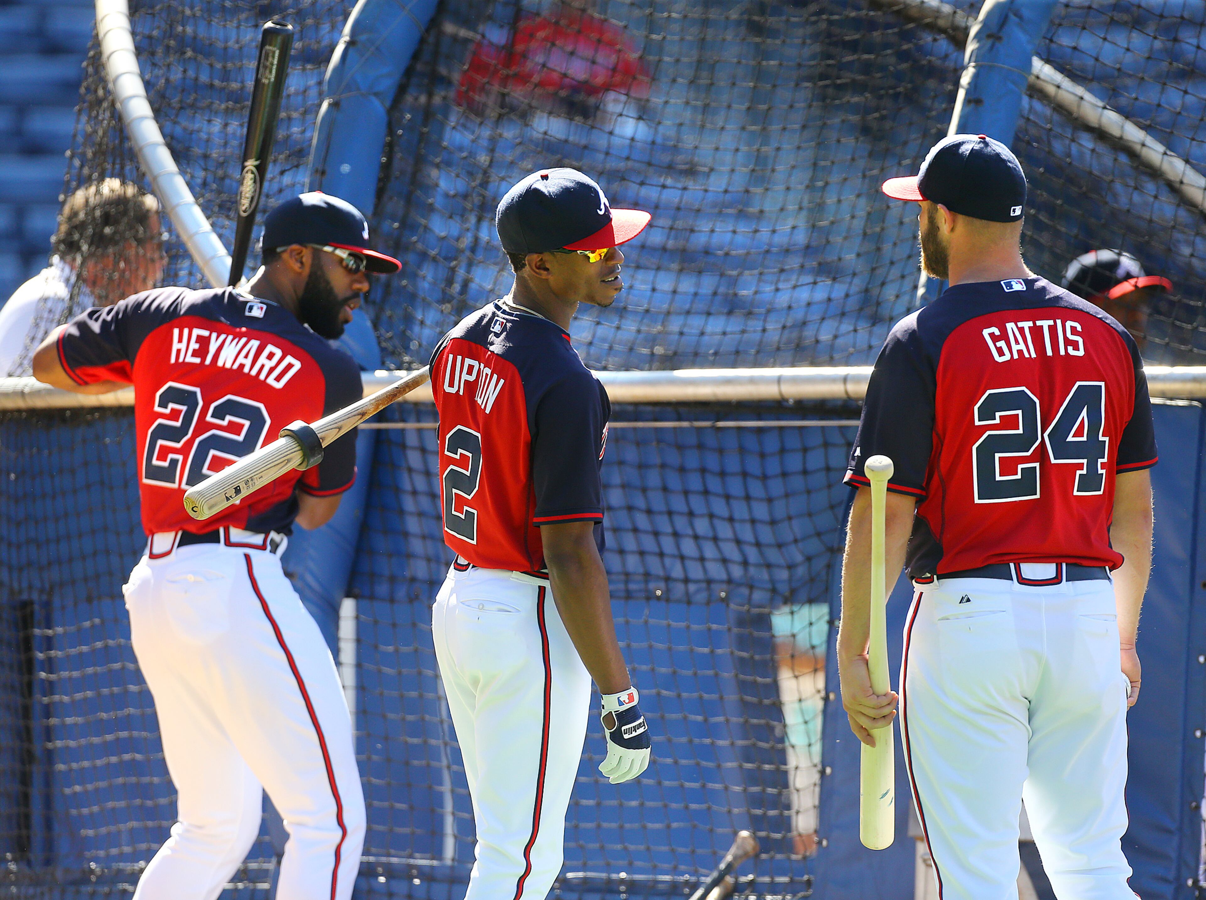 The Braves hope to get the bats going against the Cardinals by shaking up the batting order and lineup while Jason Heyward (from left), B.J. Upton, and Evan Gattis take batting practice before their MLB game on Monday, May 5, 2014, in Atlanta.