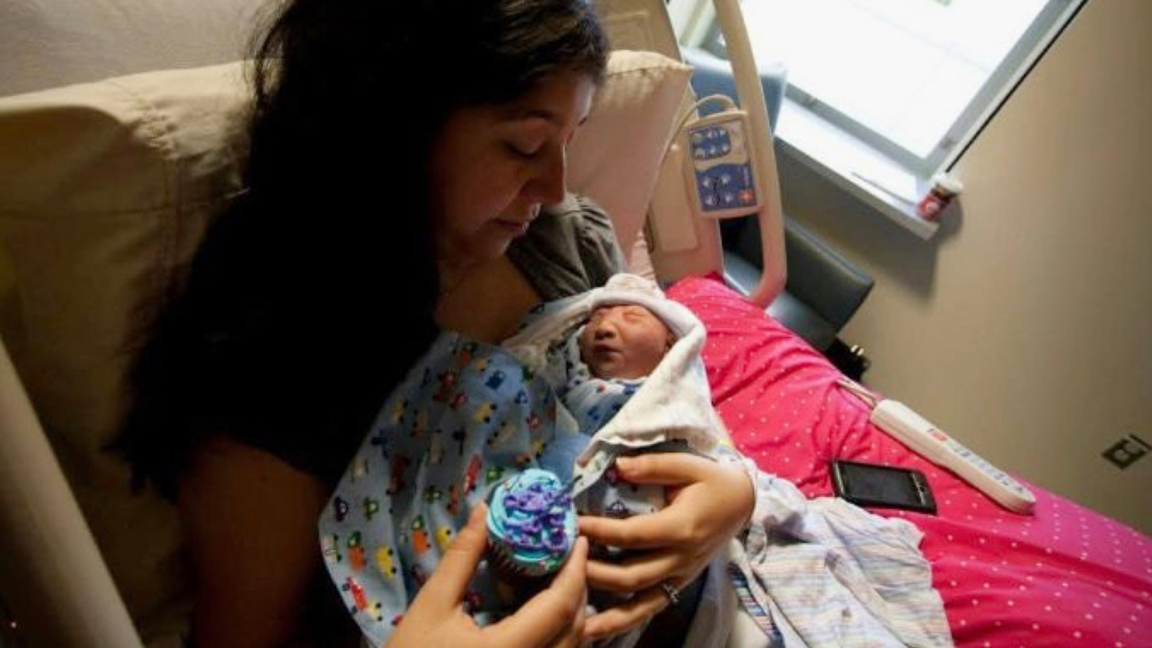 In this photo provided by Andrea Lopez, she cradles her son, Gabriel Crude, at a hospital Bakersfield, Calif., in 2011, where he was born with anencephaly, a rare and severe birth defect tied to a lack of folic acid, a key vitamin. (Courtesy Andrea Lopez via AP)