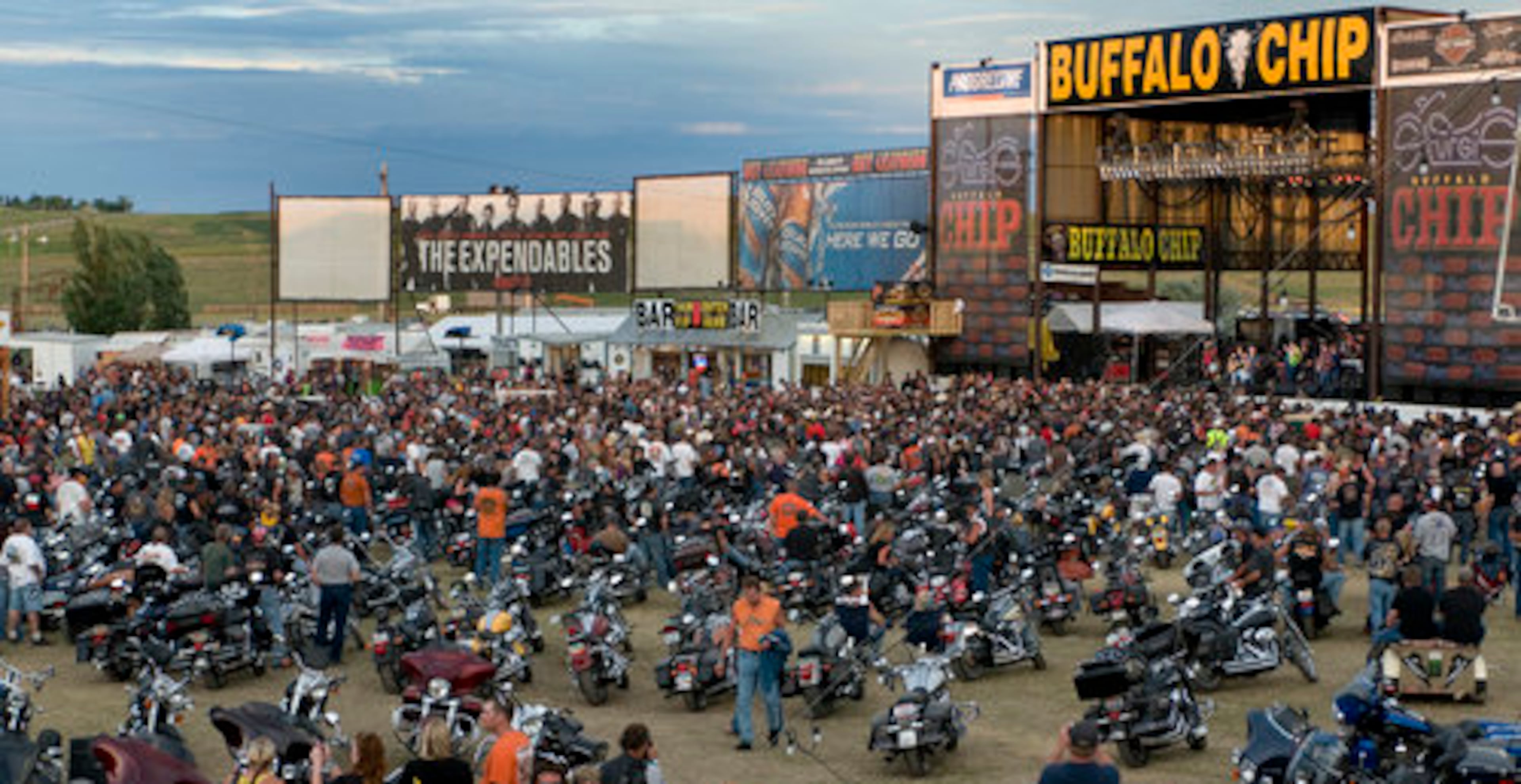 The infield at the Buffalo Chip Campground concert stage filled with bikes and bikers hours before concert began.