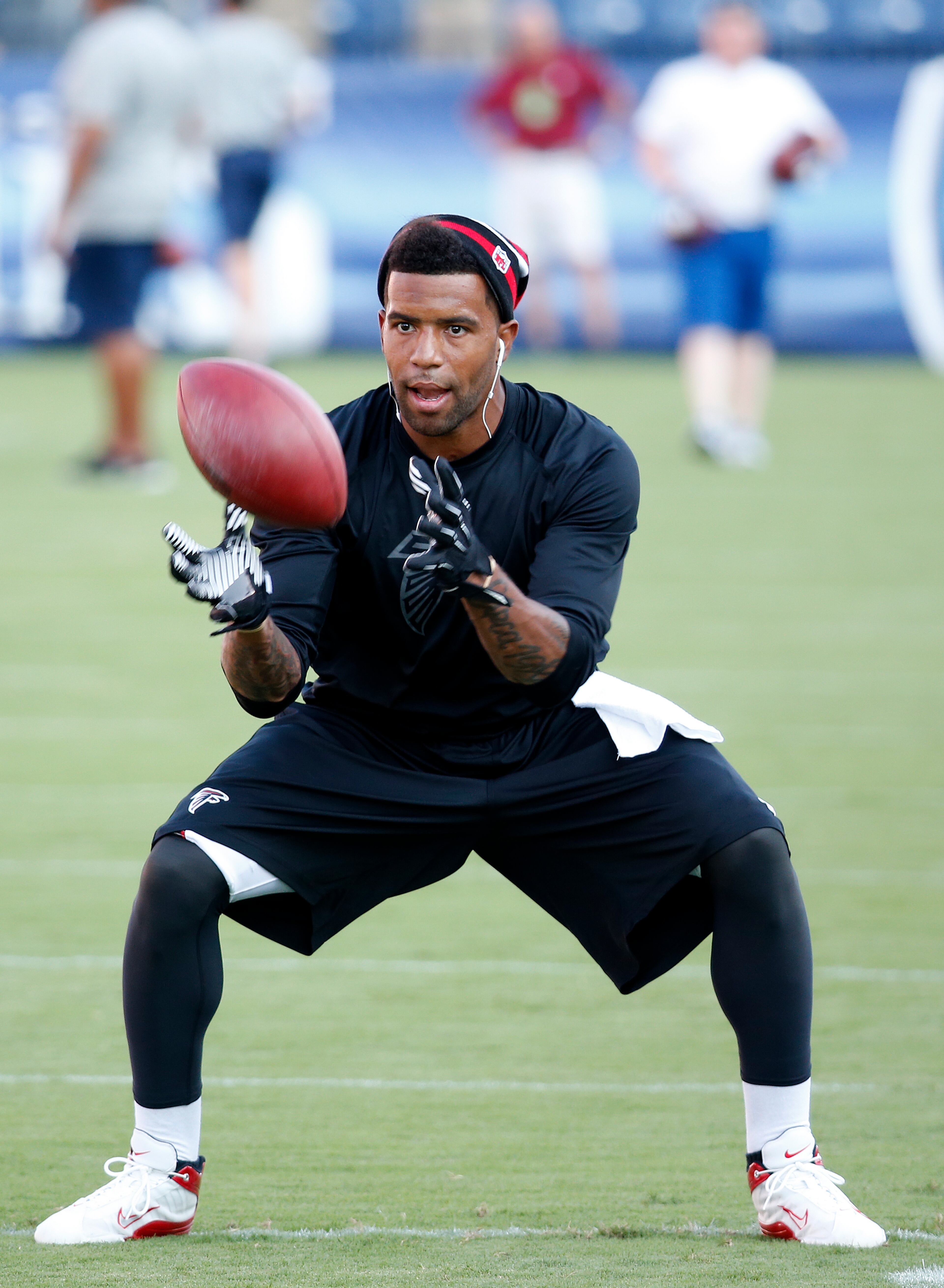 Atlanta Falcons free safety Thomas DeCoud works before the first half of an NFL preseason football game against the Tennessee Titans, Saturday, Aug. 24, 2013, in Nashville, Tenn. (AP Photo/John Russell)