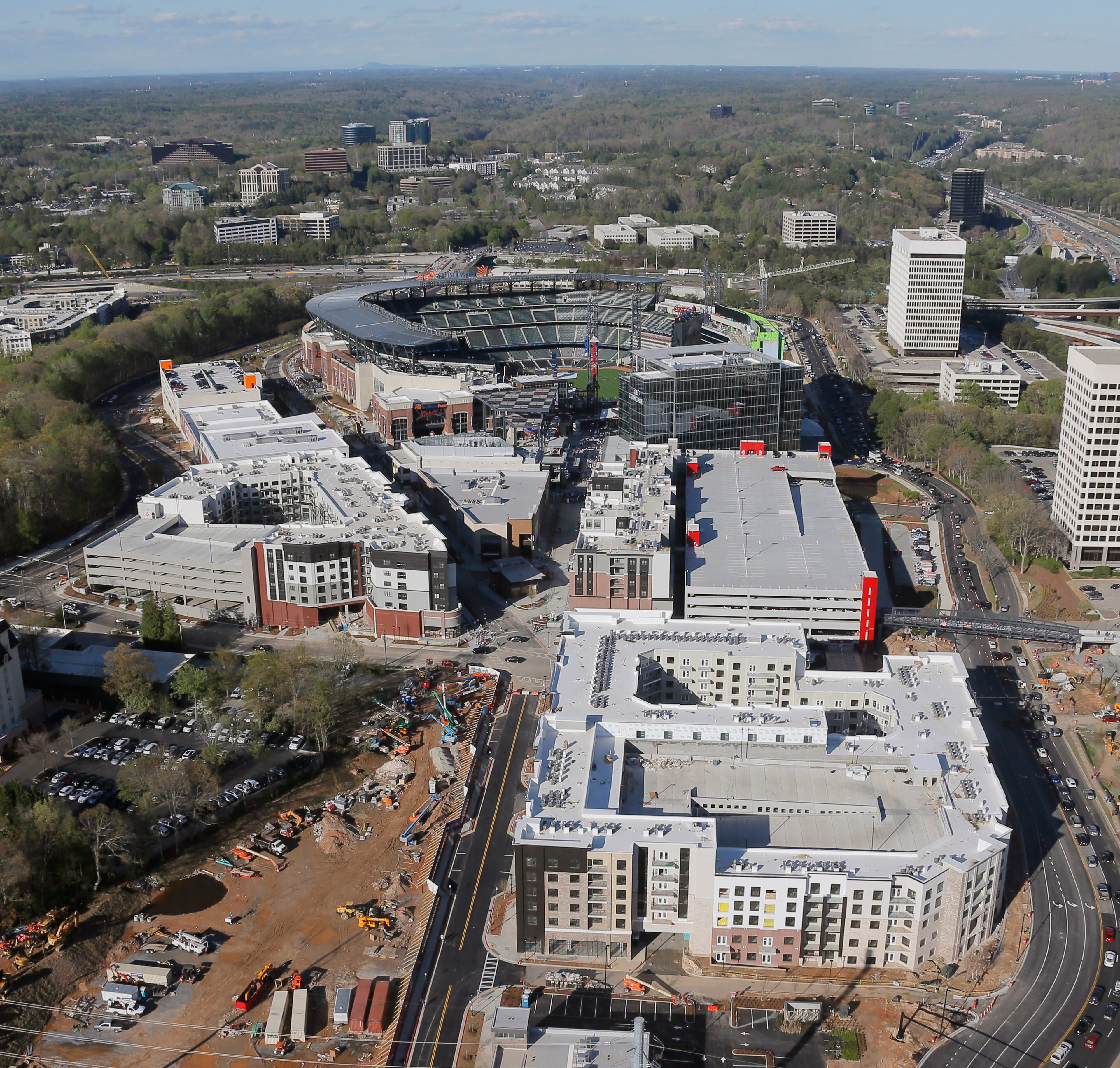 Mar. 31, 2017 - Atlanta - View of SunTrust park looking east with Battery Park in the foreground. The Braves open their new stadium the day after a massive fire destroyed a section of I-85 in downtown Atlanta. BOB ANDRES /BANDRES@AJC.COM