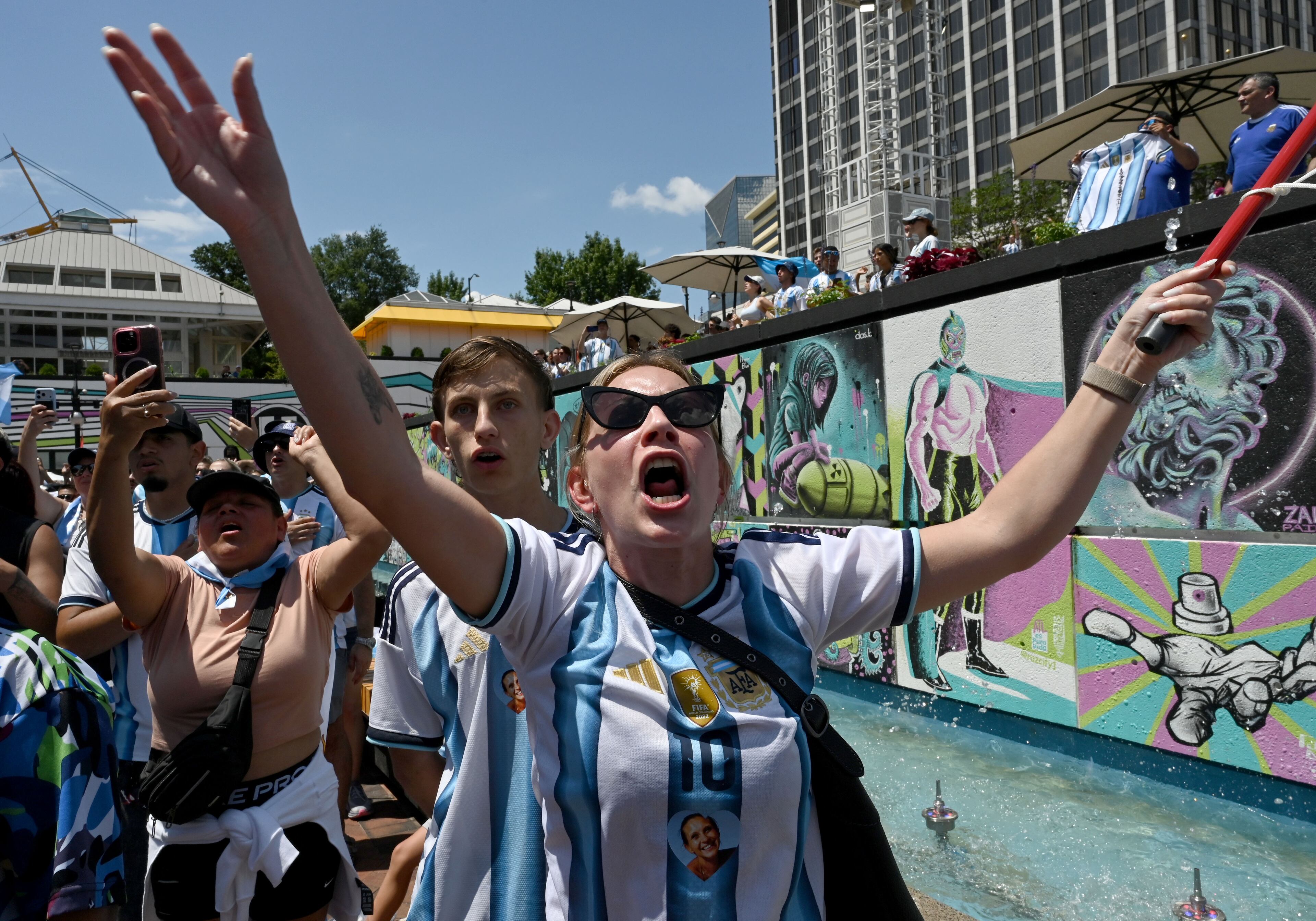 Argentina fans react as they gather at Underground Atlanta to watch the FIFA World Cup semifinal between Argentina and England on Wednesday, July 15, 2026, in Atlanta. (Hyosub Shin/AJC)