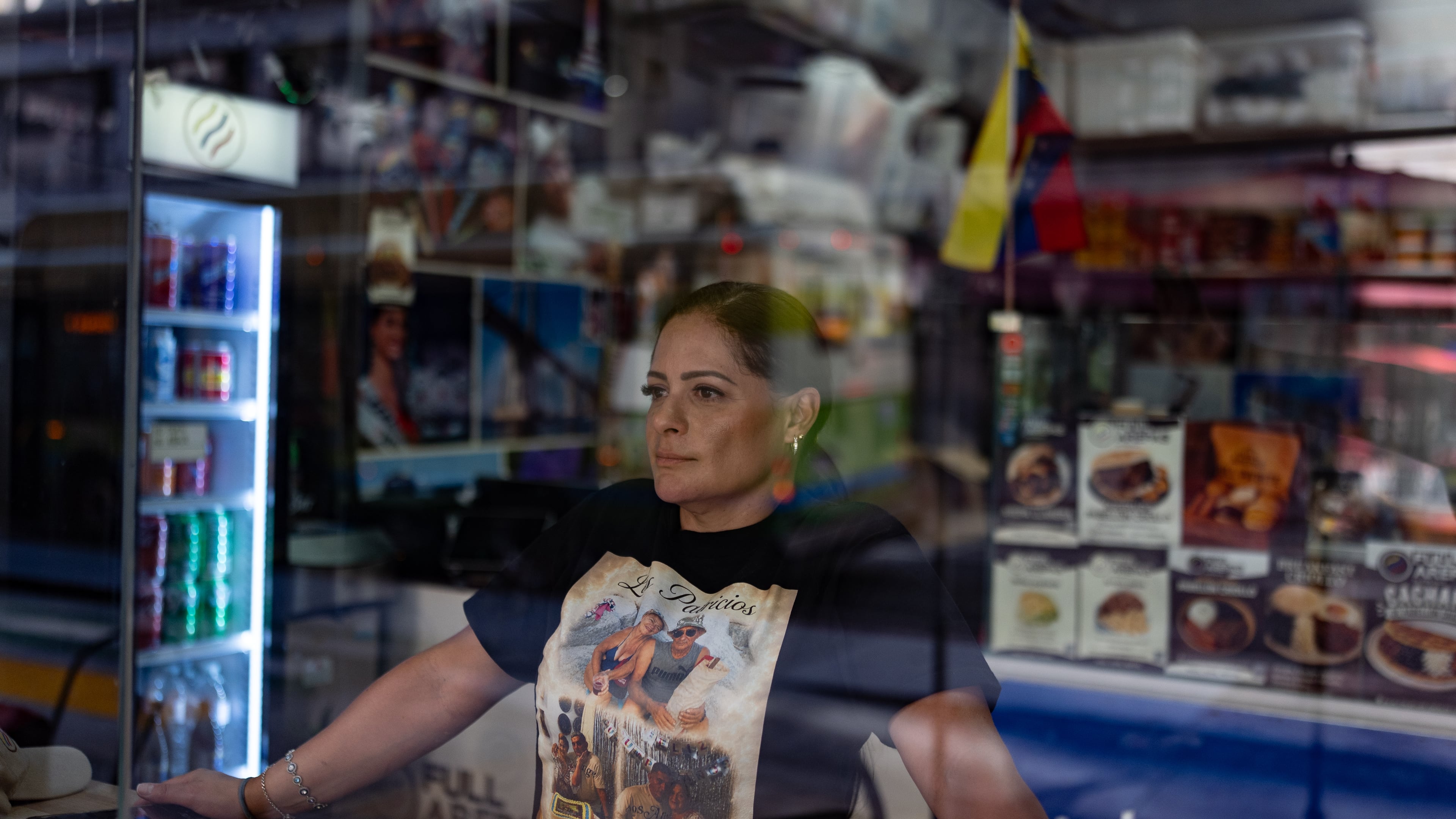 Kelly Granado, whose parents died in Venezuela's June 24 earthquakes, poses for photos at her restaurant in downtown Los Angeles, Tuesday, Aug. 25, 2026. (AP Photo/Jae C. Hong)