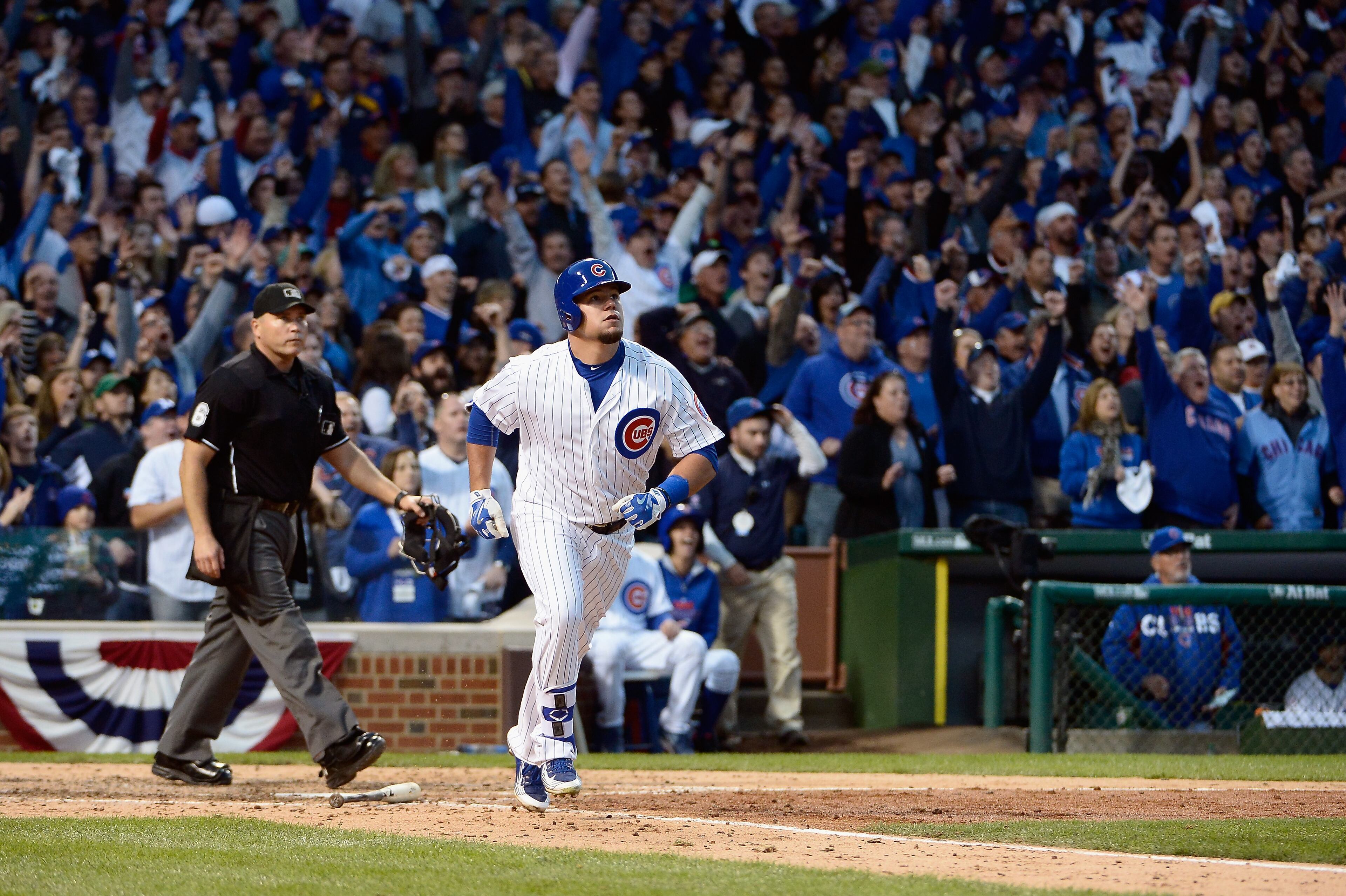 Kyle Schwarber #12 of the Chicago Cubs watches his solo home run in the seventh inning against the St. Louis Cardinals during game four of the National League Division Series at Wrigley Field on October 13, 2015 in Chicago, Illinois. (Photo by David Banks/Getty Images)