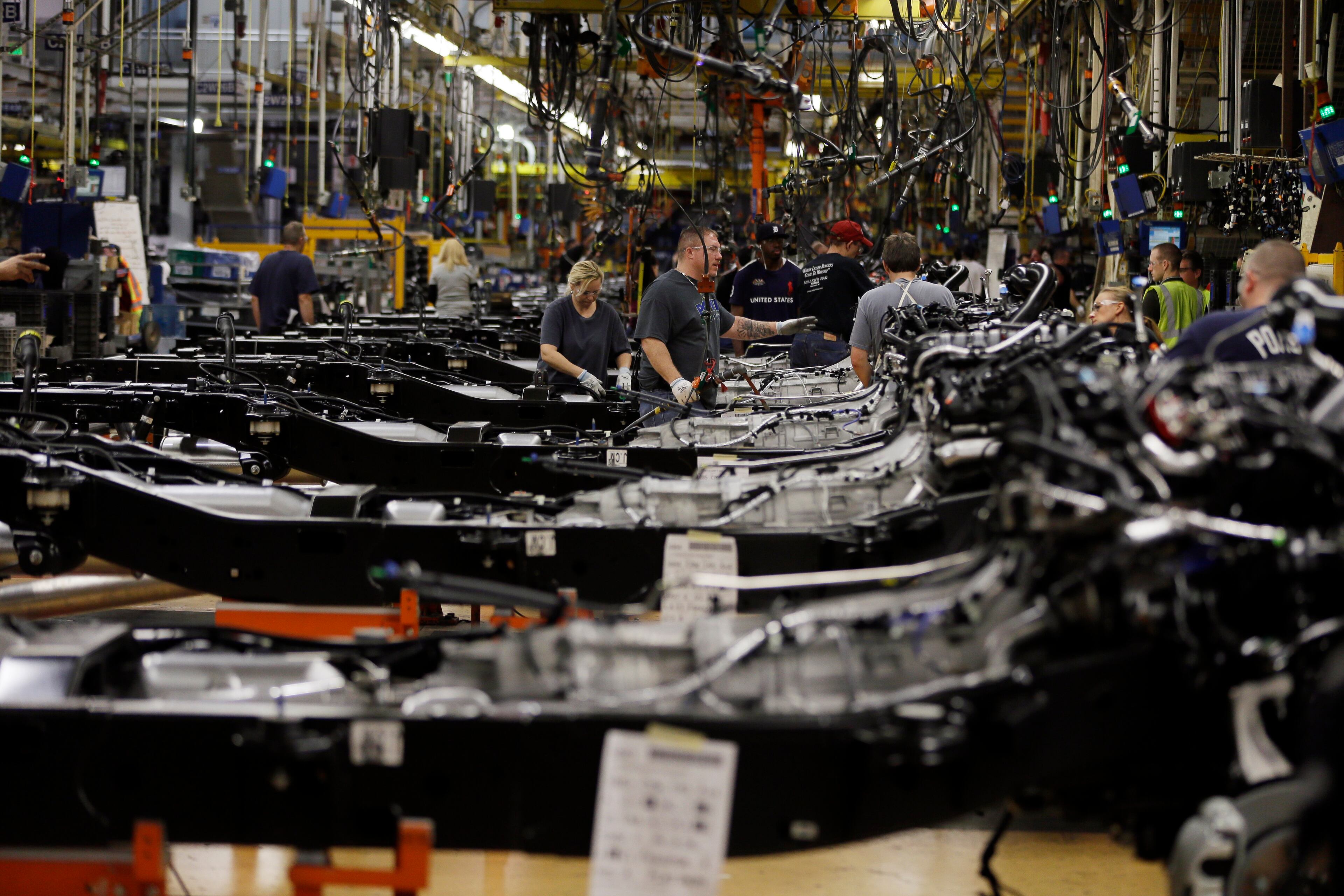 The new Ford F-150 truck is assembled at the Rouge Truck Plant in Dearborn, Mich. It's the automaker's biggest bet in decades: an aluminum-sided F-150 that could set a new industry standard _ or cost the company its pickup truck crown. It will arrive on U.S. dealer lots next month. Aluminum _ which is lighter than steel but just as strong _ isn't new to the auto industry, but this is the first time it will cover the entire body of such a high-volume vehicle. (AP Photo/Carlos Osorio)