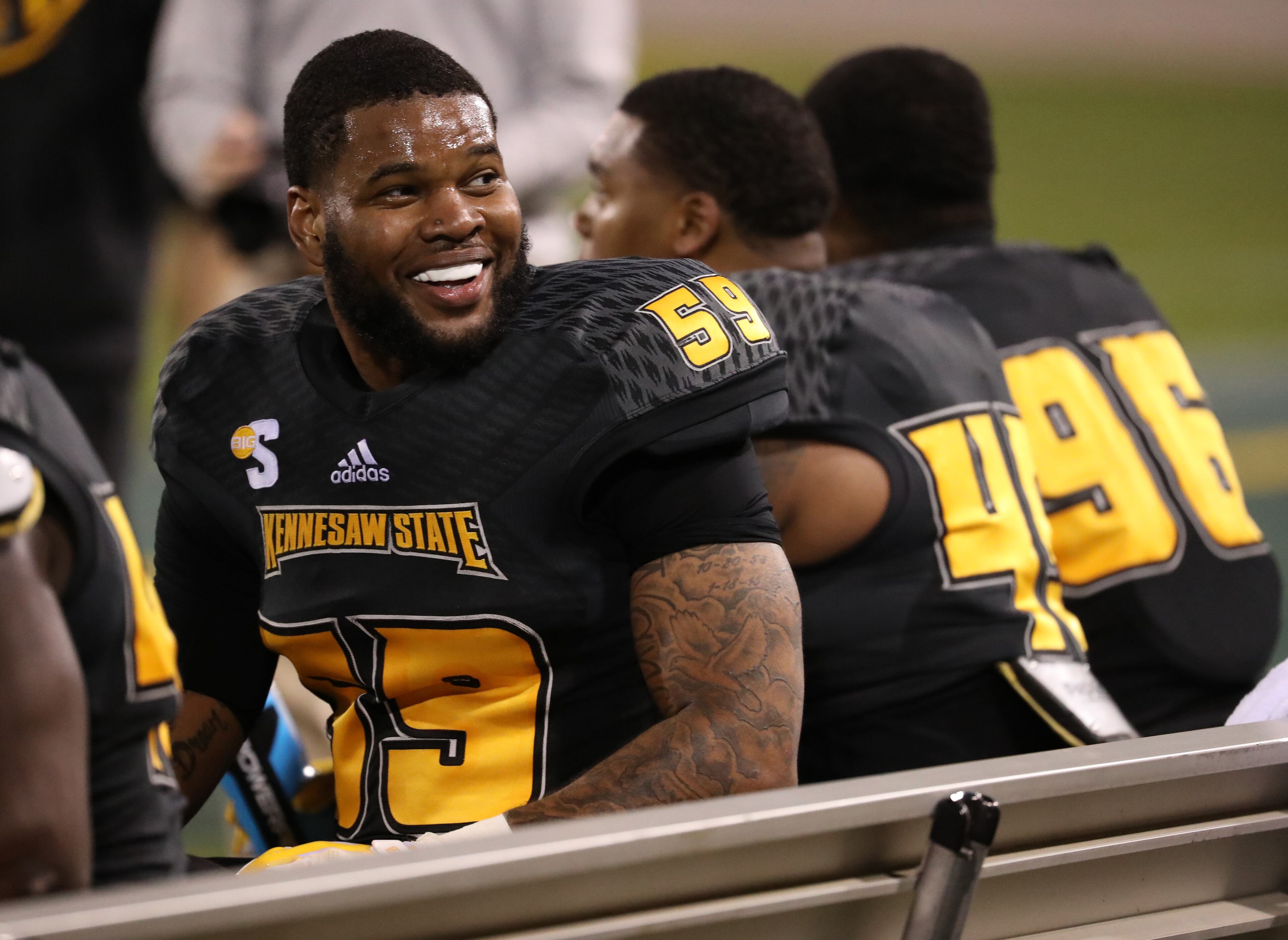 March 22, 2019 - Kennesaw, Ga: Kennesaw State Owls defensive lineman Desmond Johnson (59) talks with fans during the KSU spring football game at Fifth Third Bank Stadium Friday, March 22, 2019 in Kennesaw, Ga.. (JASON GETZ/SPECIAL TO THE AJC)