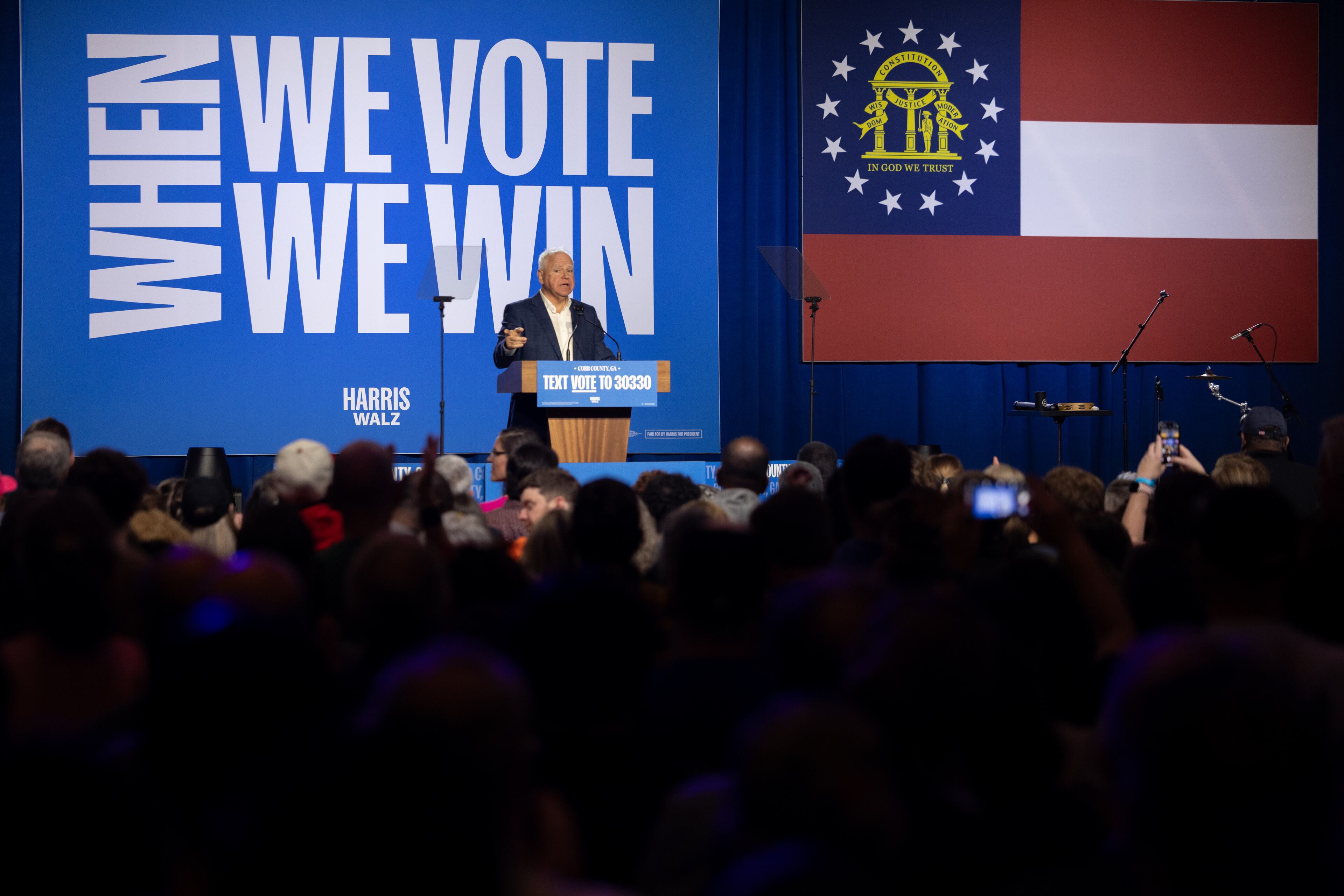 Governor Tim Walz speaks at a campaign really with Second Gentleman Doug Emhoff and Jon Bon Jovi in Cobb County, Georgia on November 3, 2024. (Nathan Posner for the Atlanta Journal-Constitution)