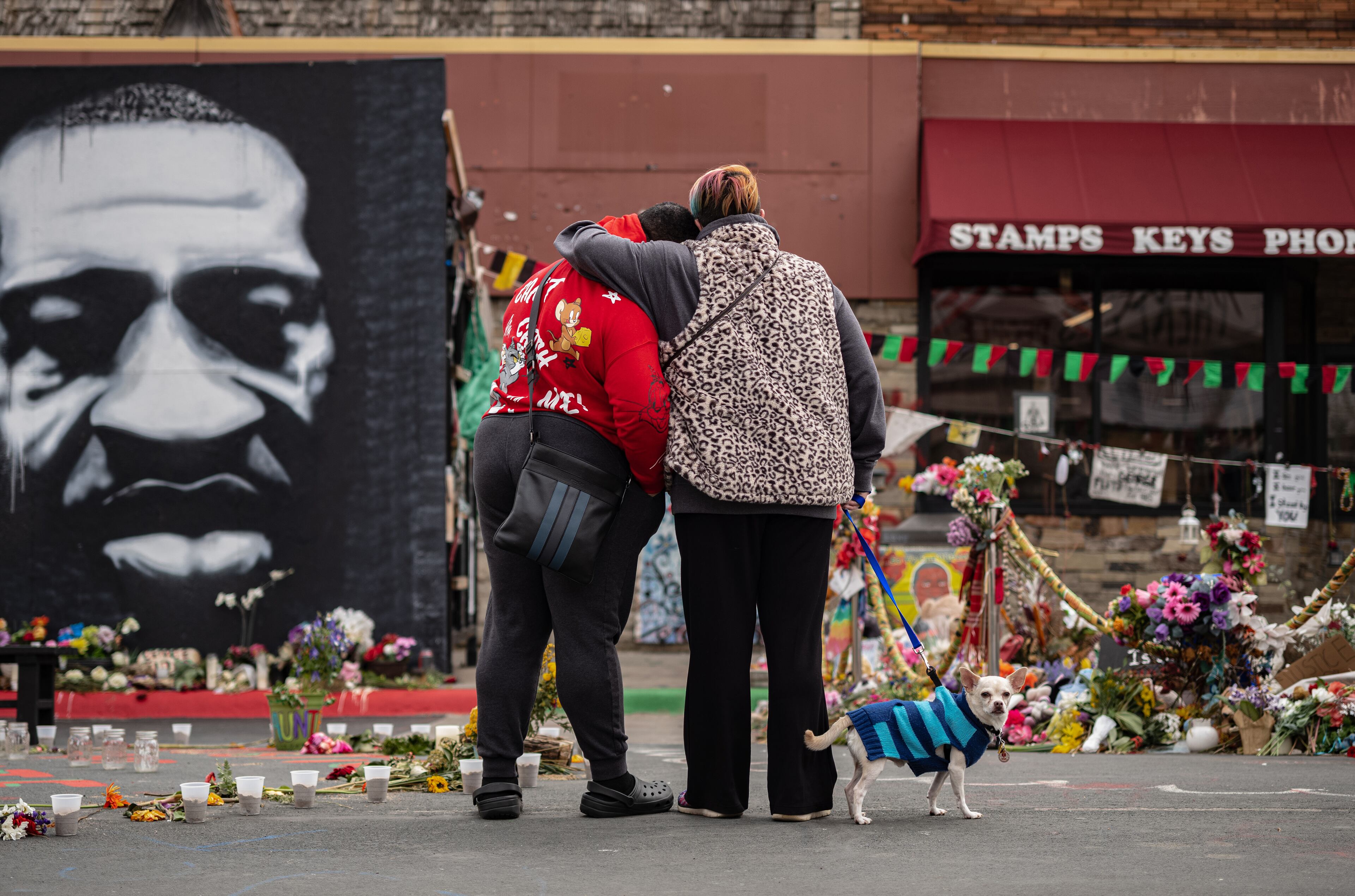 People visit the George Floyd memorial in Minneapolis on Tuesday, April 20, 2021, as the jury continues deliberations in the Derek Chauvin trial. Chauvin, a former police officer is charged in the death of George Floyd while in police custody last year. (Amr Alfiky/The New York Times)