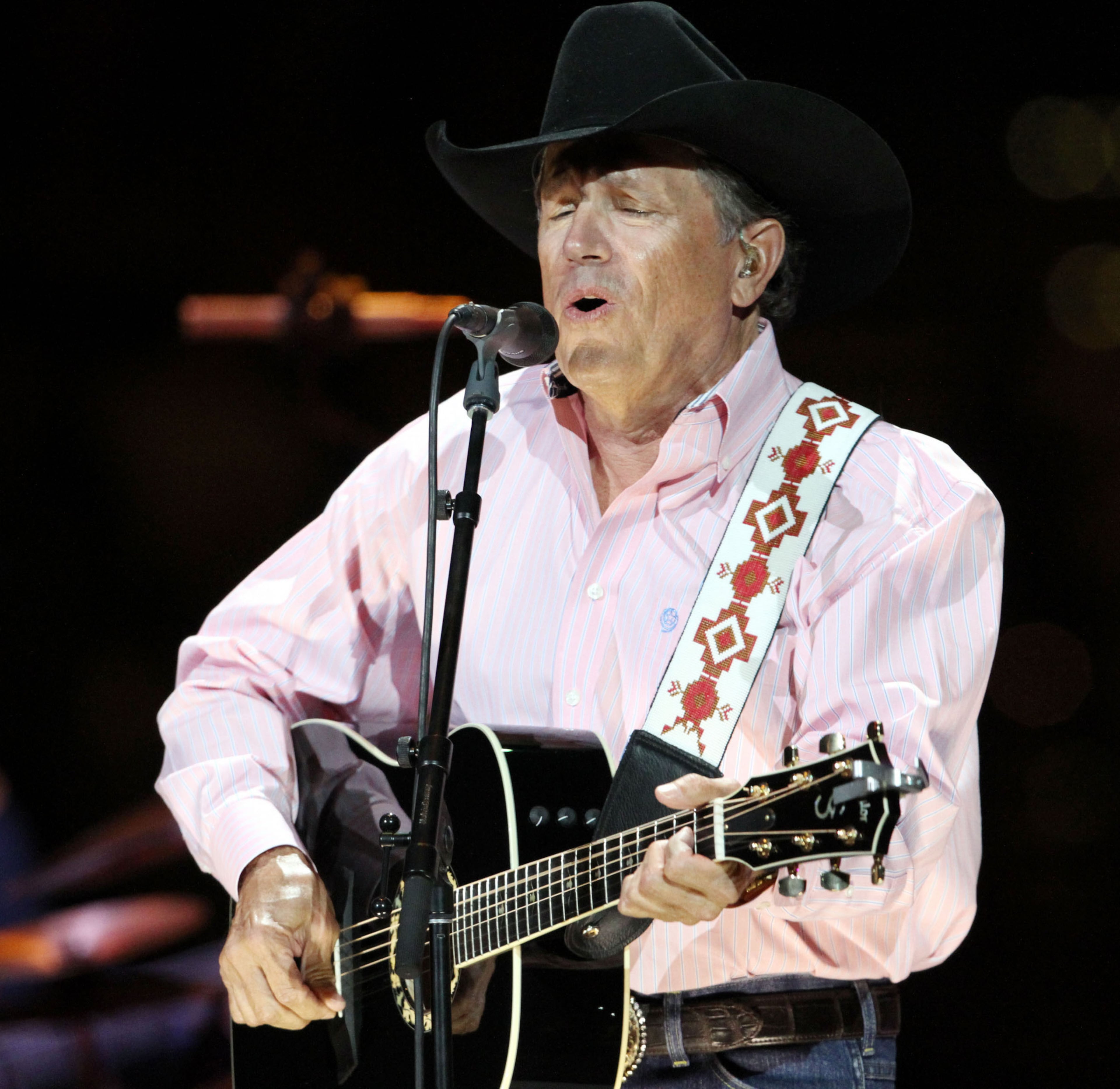 George Strait sings "The Fireman."