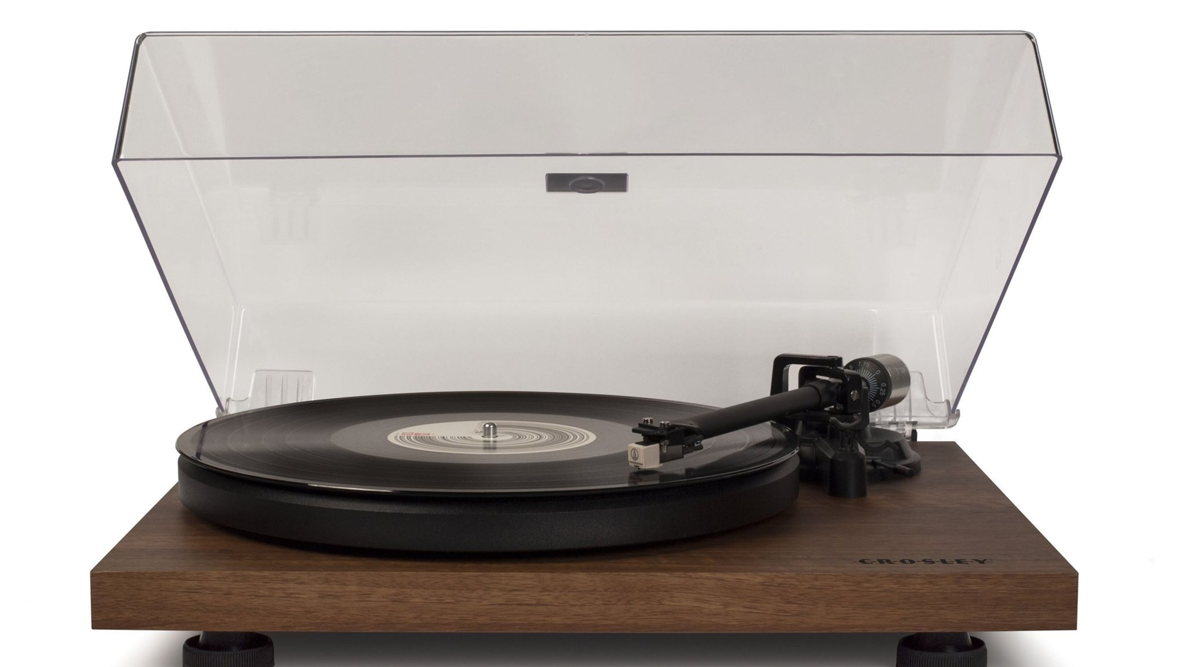 The Crosley C6 two-speed manual turntable looks great in a walnut-colored veneer shell, with an acrylic folding lid. Other choices are black or red. (Handout/TNS)