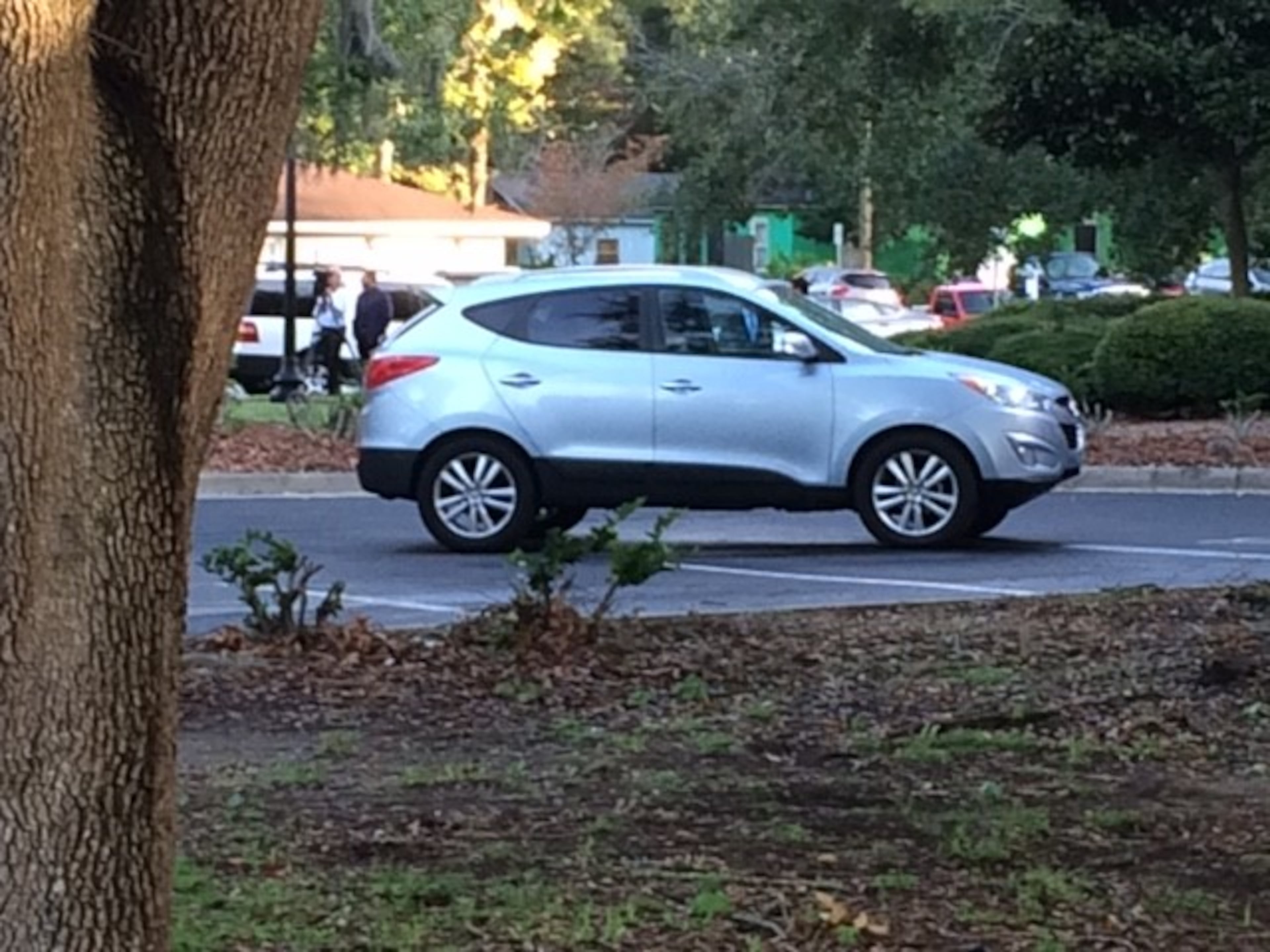 The SUV of Justin Ross Harris waits to be inspected by jurors in the parking lot of the Glynn County Courthouse, during Harris' murder trial in Brunswick, Ga., on Thursday, Oct. 27, 2016. Harris' defense team tried unsuccessfully to prevent the presentation of the SUV to the jury. Ross Harris declined to be present at the jury's viewing of what prosecutors call the crime scene. (Christian Boone / cboone@ajc.com)