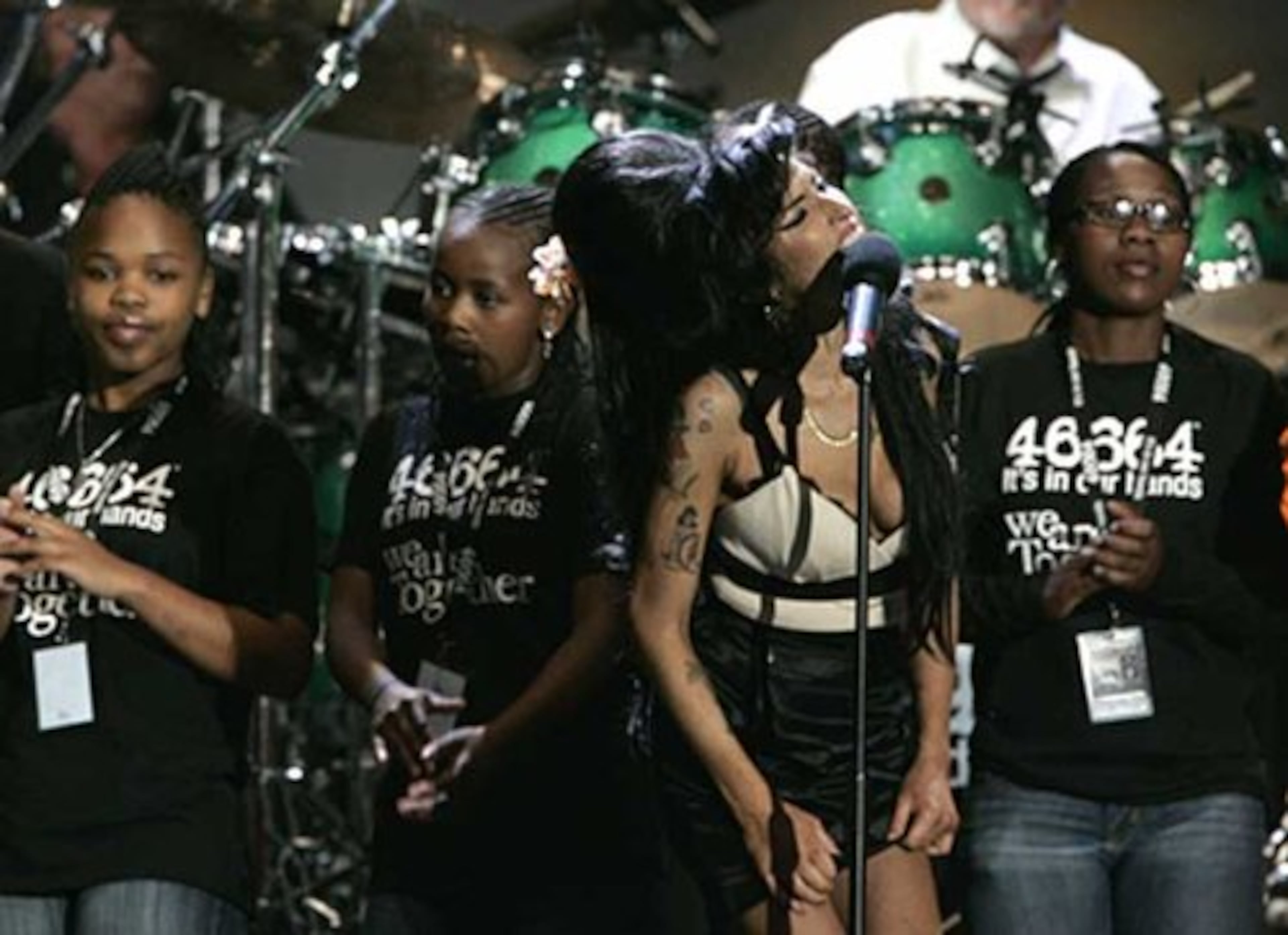Amy Winehouse performs at the close of the 46664 charity concert.