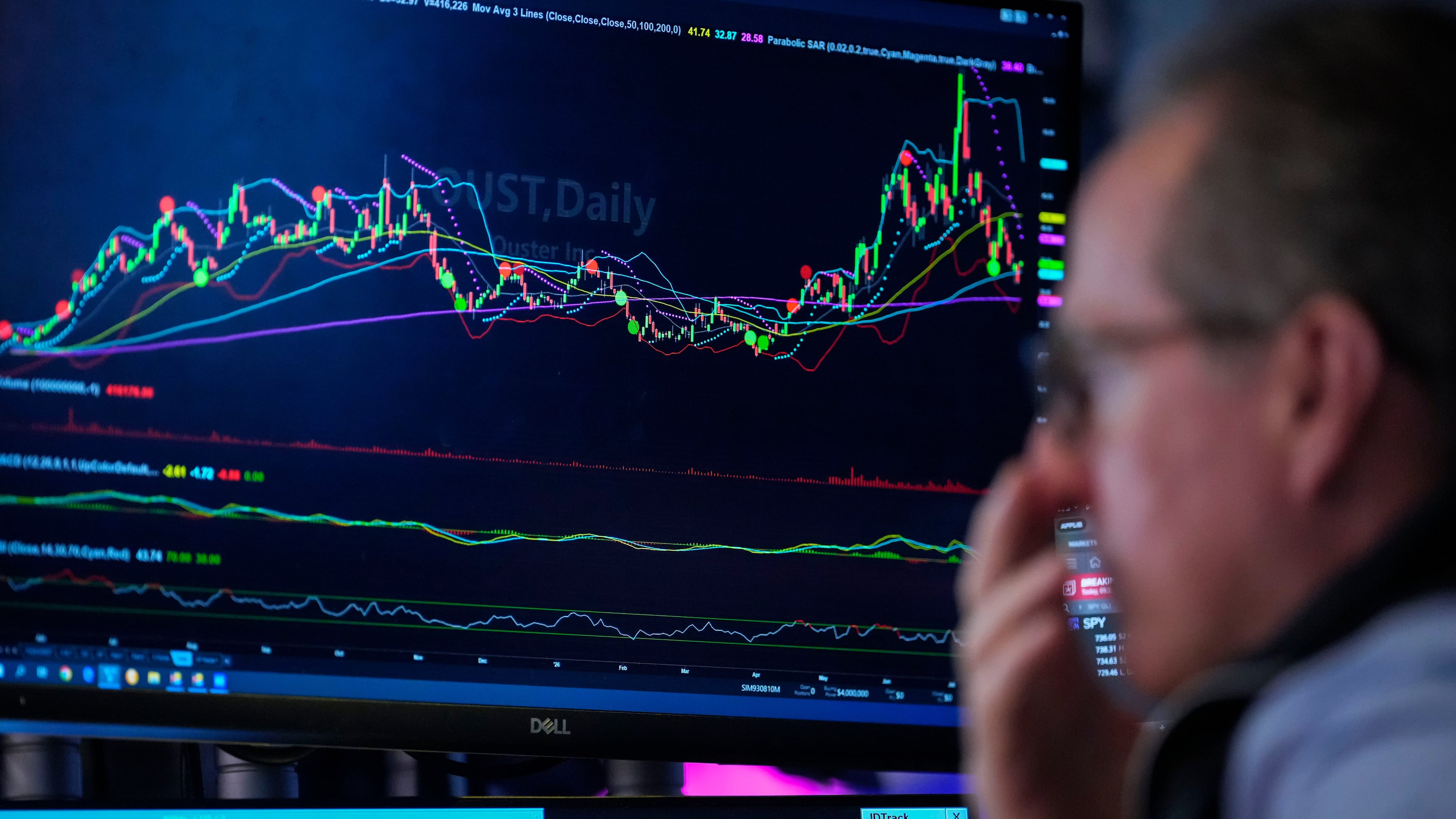 A trader works on the floor of the New York Stock Exchange, Thursday, July 30, 2026, in New York. (AP Photo/Yuki Iwamura)