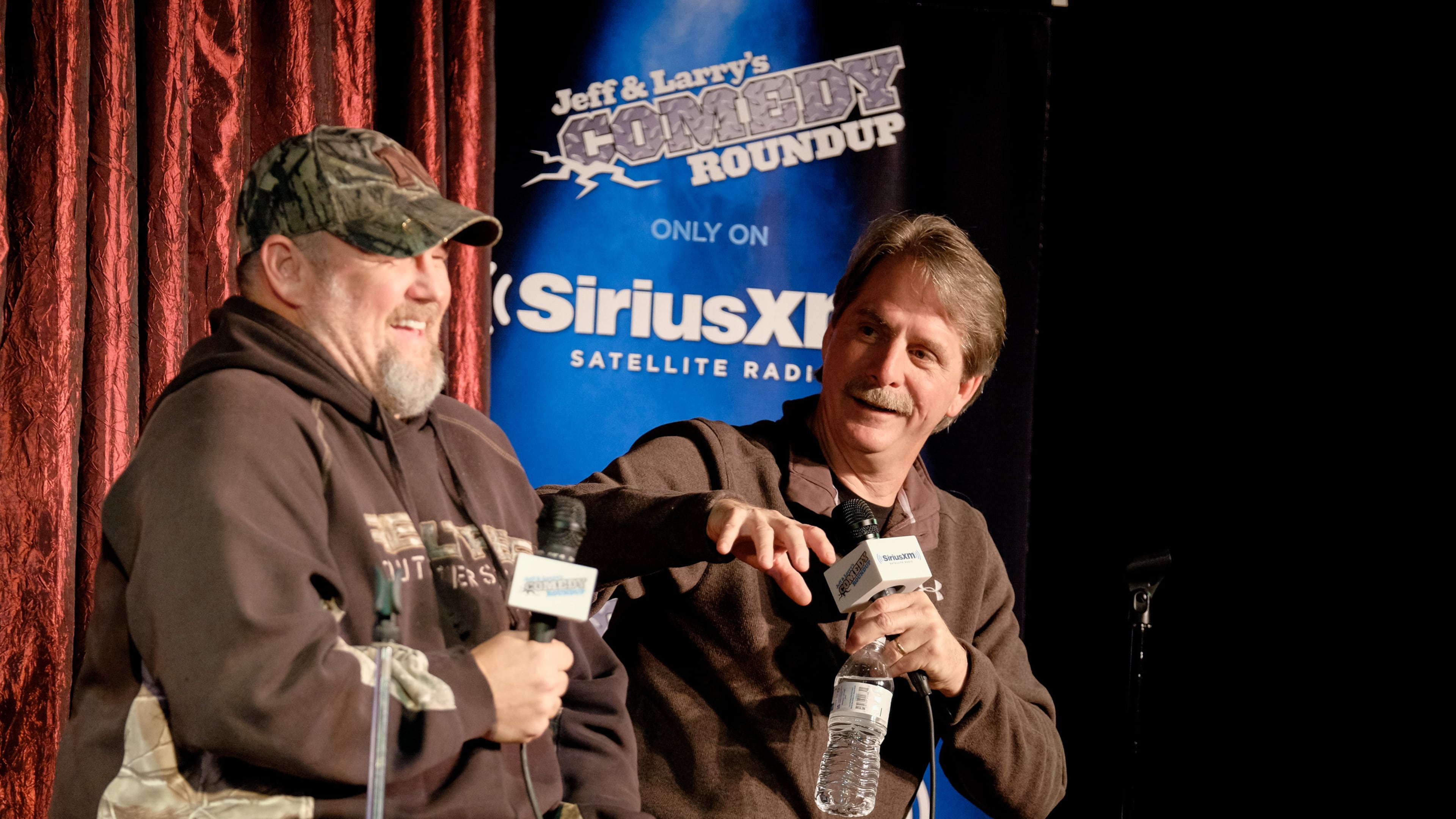 OMAHA, NE - DECEMBER 4: Larry The Cable Guy (L-R) and Jeff Foxworthy perform at the Funny Bone for a special comedic conversation to air on SiriusXM's Jeff & Larry's Comedy Roundup Channel on December 4, 2015 in Omaha, Nebraska. (Photo by Eric Francis/Getty Images for SiriusXM)