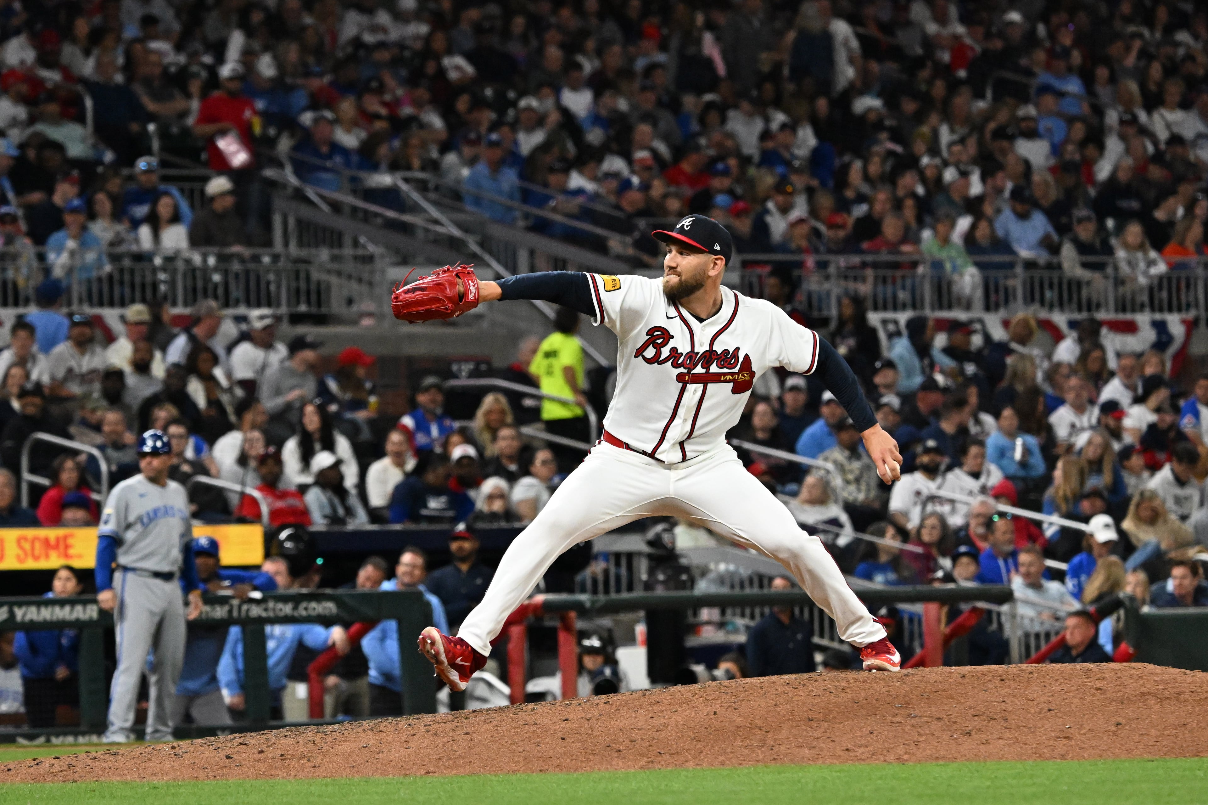 Atlanta Braves pitcher Dylan Lee (52) throws a pitch during the seventh inning of a baseball game at Truist Park, Saturday, March 28, 2026, in Atlanta. Atlanta Braves Dominic Smith hit a grand slam during the 9th inning to win 6-2 over Kansas City Royals. (Hyosub Shin/AJC)