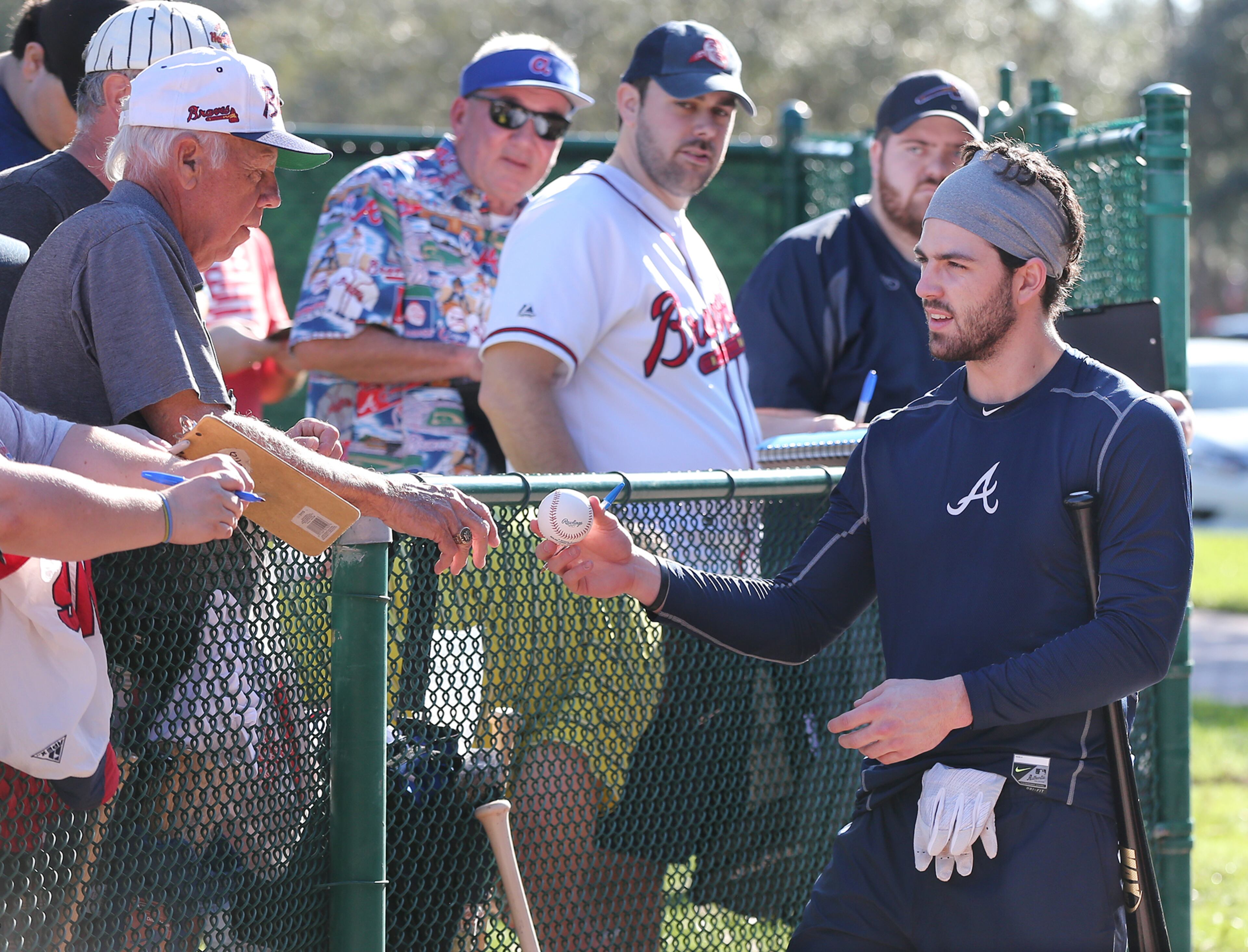 Feb 16, 2018 Lake Buena Vista: Braves shortstop Dansby Swanson signs autographs for fans after taking some batting practice in the cages, arriving for his first day of spring training on Friday, Feb 16, 2018, at the ESPN Wide World of Sports Complex in Lake Buena Vista. Curtis Compton/ccompton@ajc.com