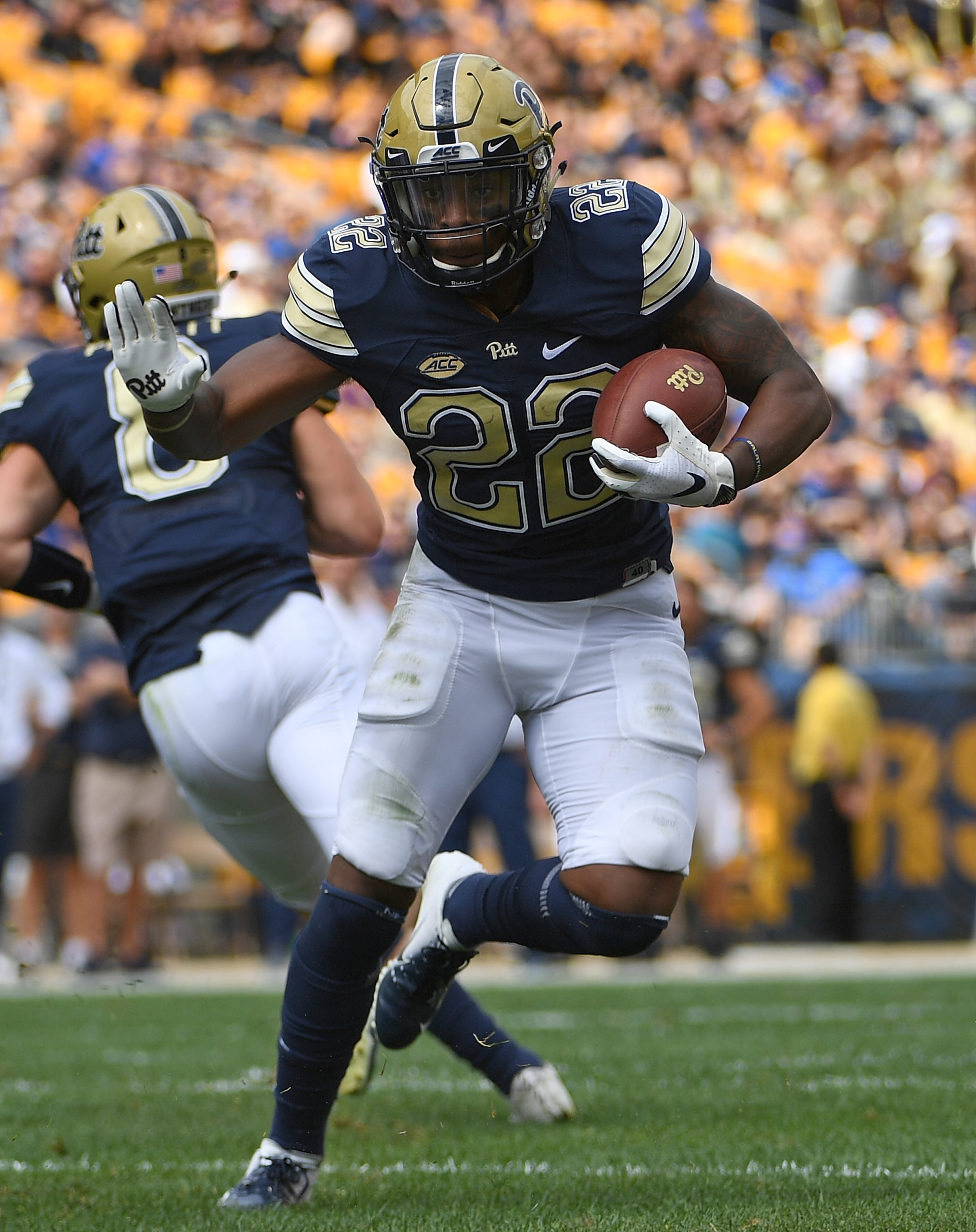 PITTSBURGH, PA - SEPTEMBER 15: Darrin Hall #22 of the Pittsburgh Panthers runs the ball for a 5 yard touchdown in the first half during the game against the Georgia Tech Yellow Jackets at Heinz Field on September 15, 2018 in Pittsburgh, Pennsylvania. (Photo by Justin Berl/Getty Images)