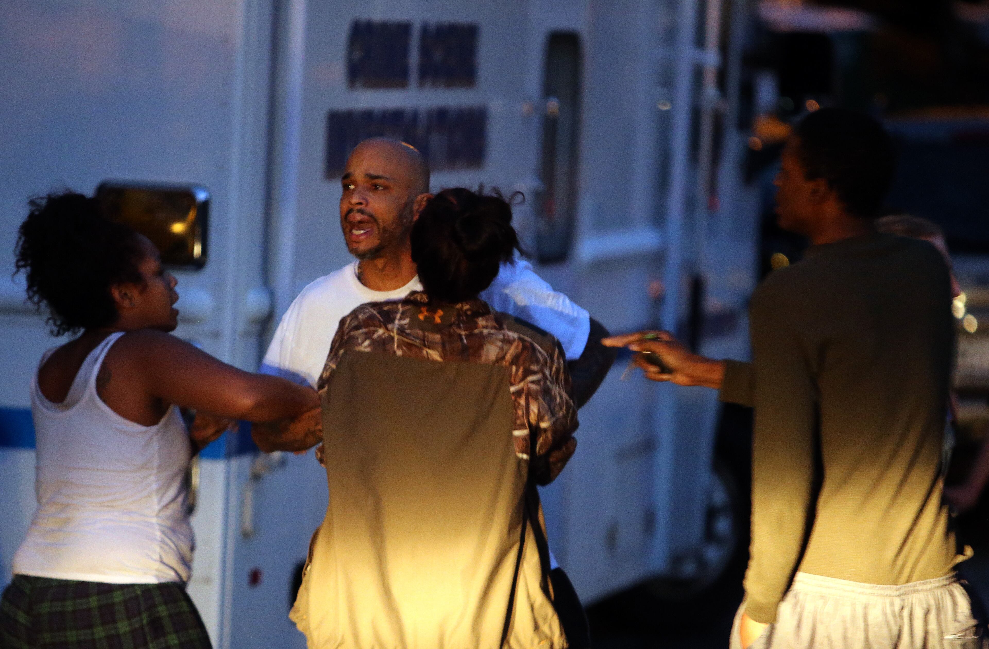 October 14, 2014 Peachtree Corners: A man believed to be the father of some of the victims arrives at the scene of a domestic shooting that left three people dead and two wounded Monday evening October 14, 2014 in Peachtree Corners. The person believed to be the shooter died. BEN GRAY / BGRAY@AJC.COM