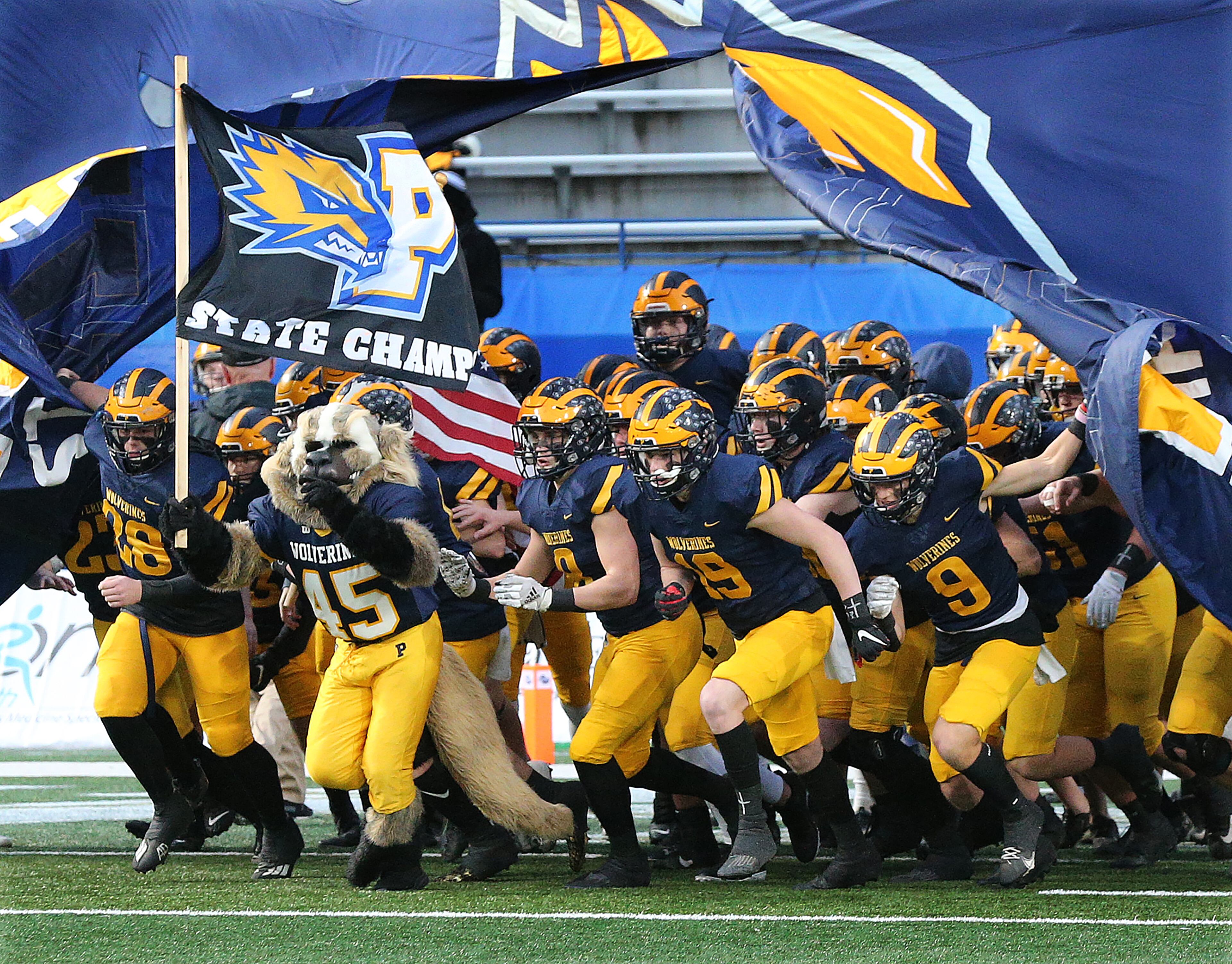 The defending state champs Prince Avenue Christian take the field to play Trinity Christian in their GHSA Class A Private Championship game on Thursday, Dec 9, 2021, in Atlanta. “Curtis Compton / Curtis.Compton@ajc.com”`