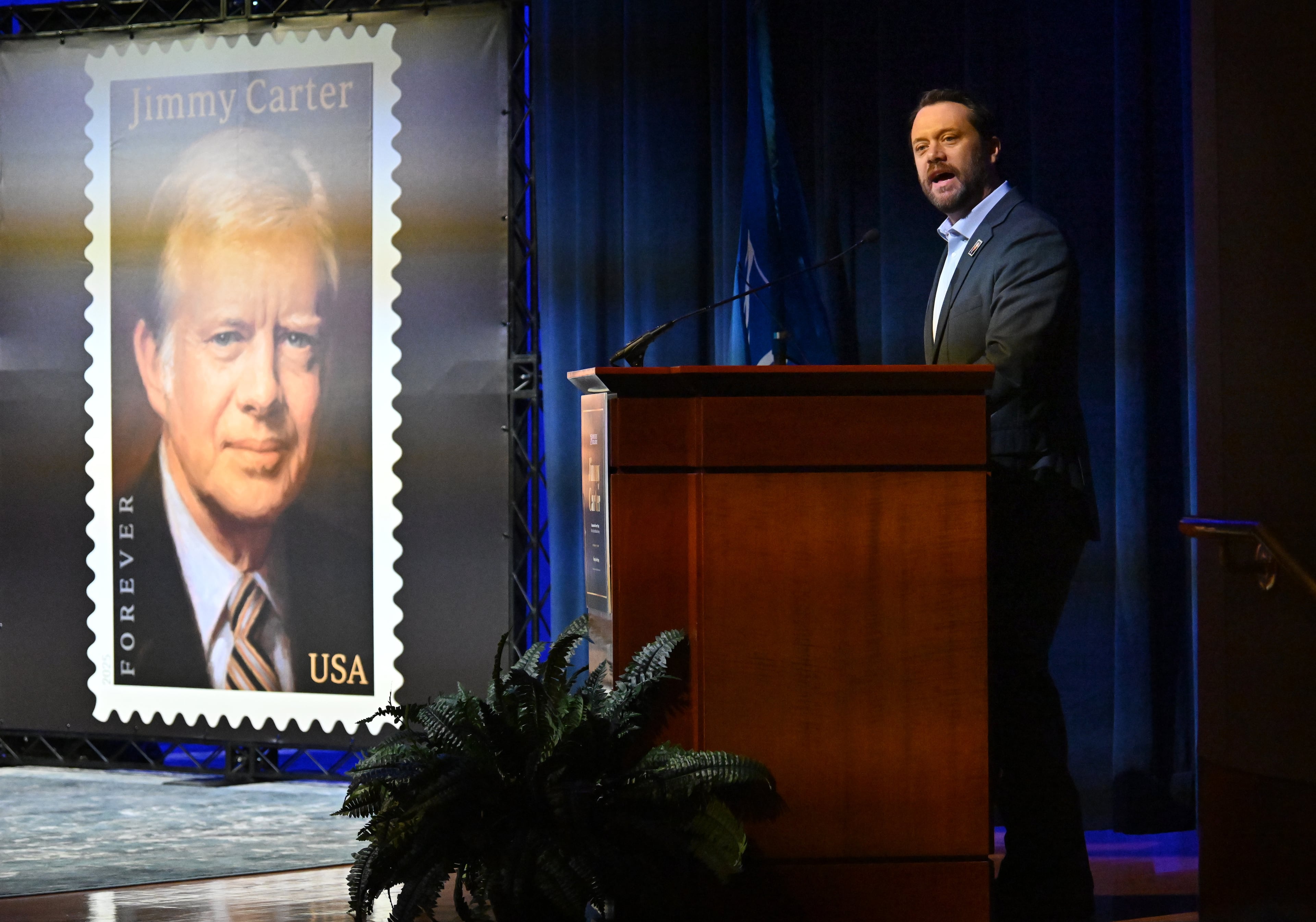 Jason Carter celebrated the release of the stamp honoring his late grandfather, President Jimmy Carter, at an event in Atlanta earlier this month.