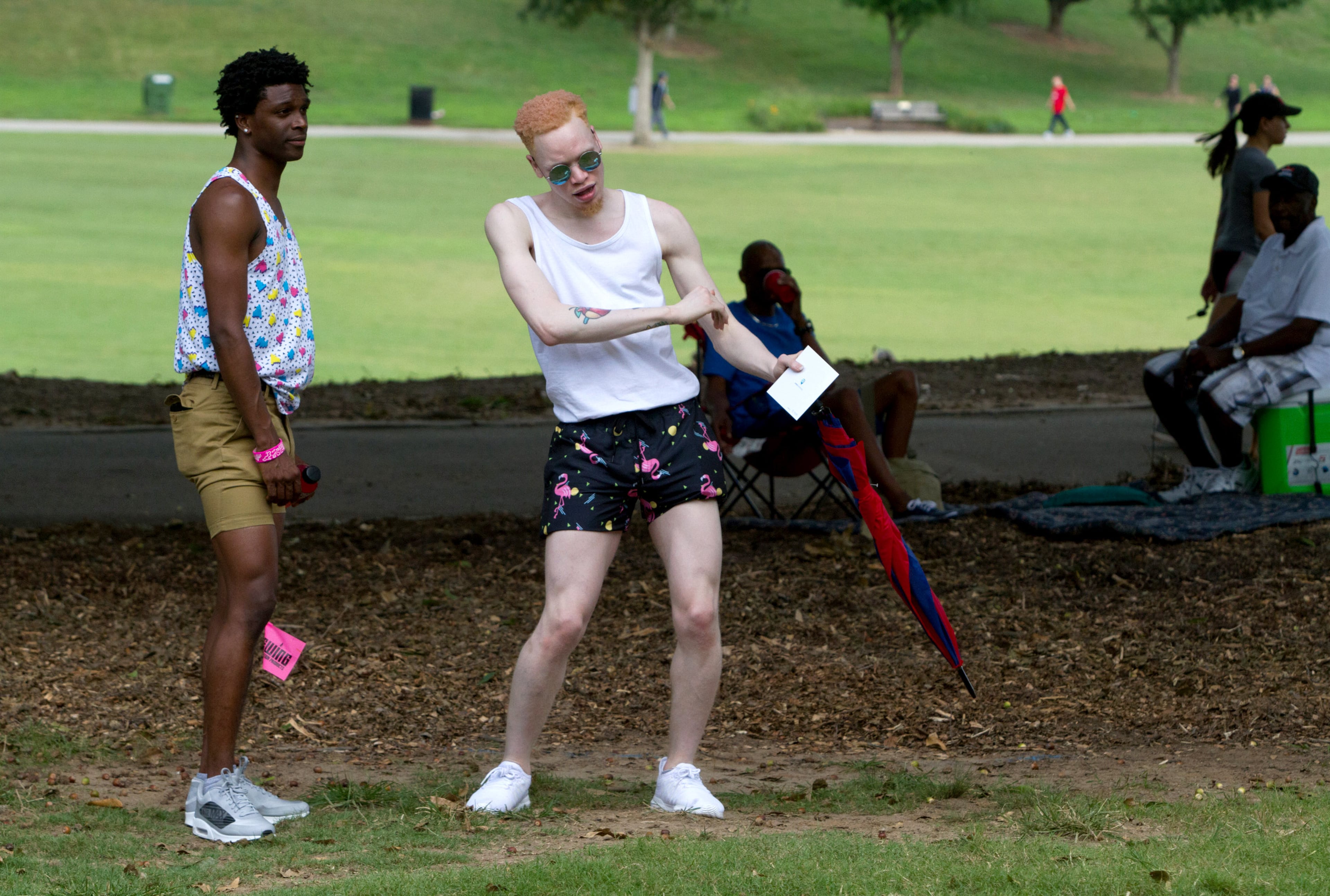 Tyderious Favors (left) watches Ty Durham dance to the music during the Pure Heat Community Festival celebrating Atlanta Black Pride Weekend in Piedmont Park on Sunday, September 2, 201. (Photo: STEVE SCHAEFER / SPECIAL TO THE AJC)