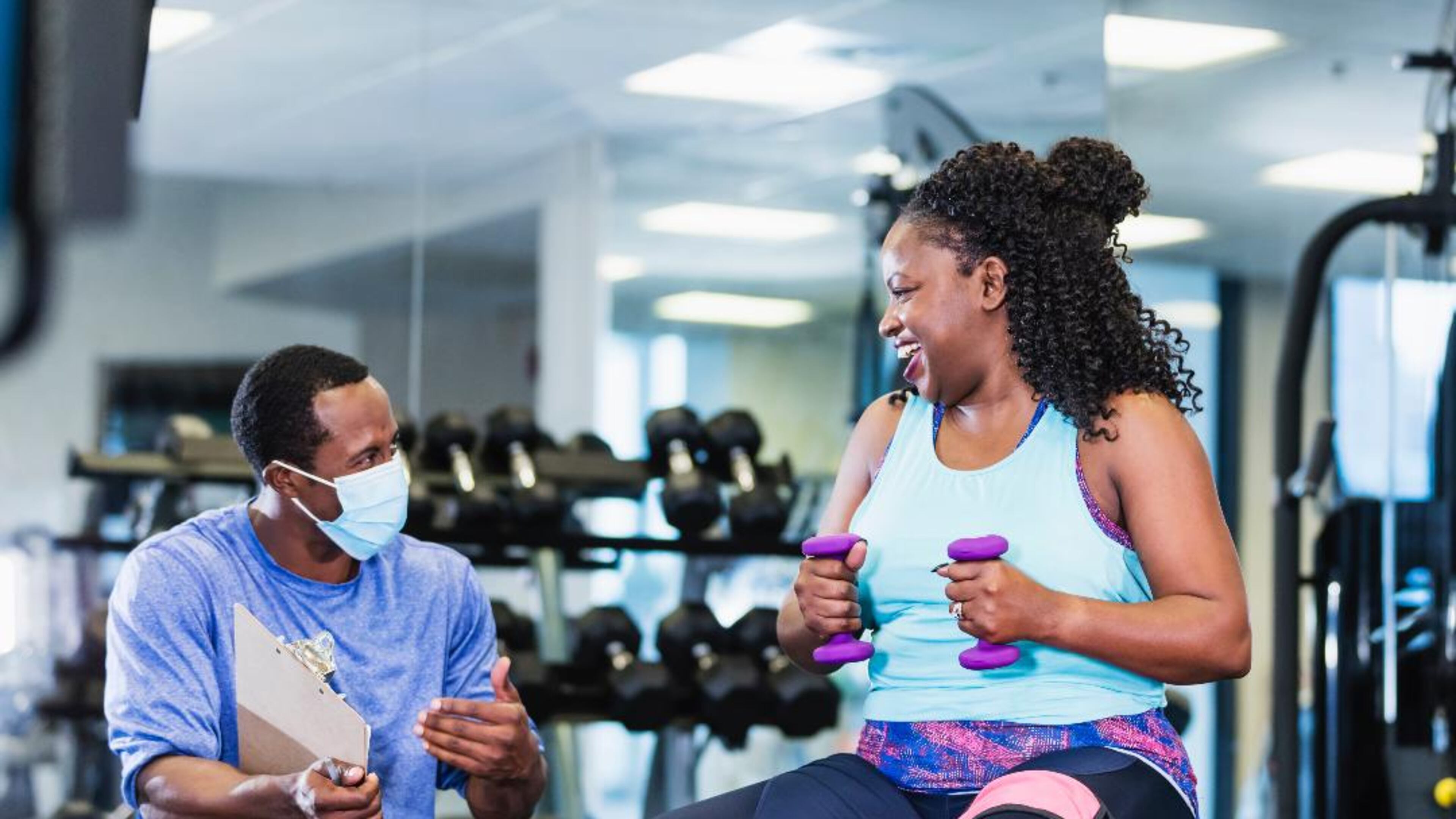 A coach offers fitness tips and support at the YMCA of Metro Atlanta. (FILE/Courtesy of the YMCA of Metro Atlanta)