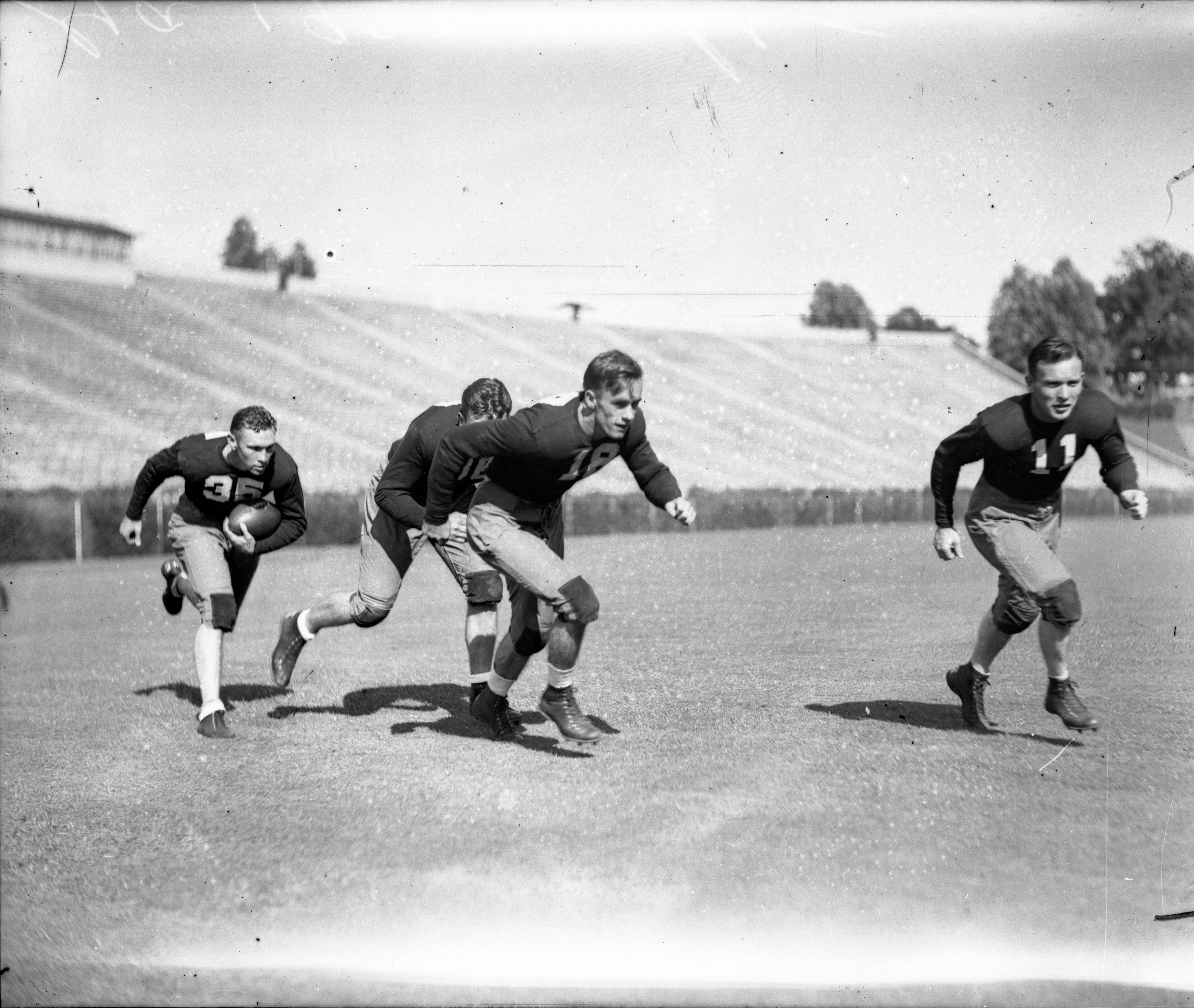 University of Georgia football team practicing, Athens, Georgia, 1933. LBGlass - 027, Lane Brothers Commercial Photographers Photographic Collection, 1920-1976. Photographic Collection, Special Collections and Archives, Georgia State University Library.