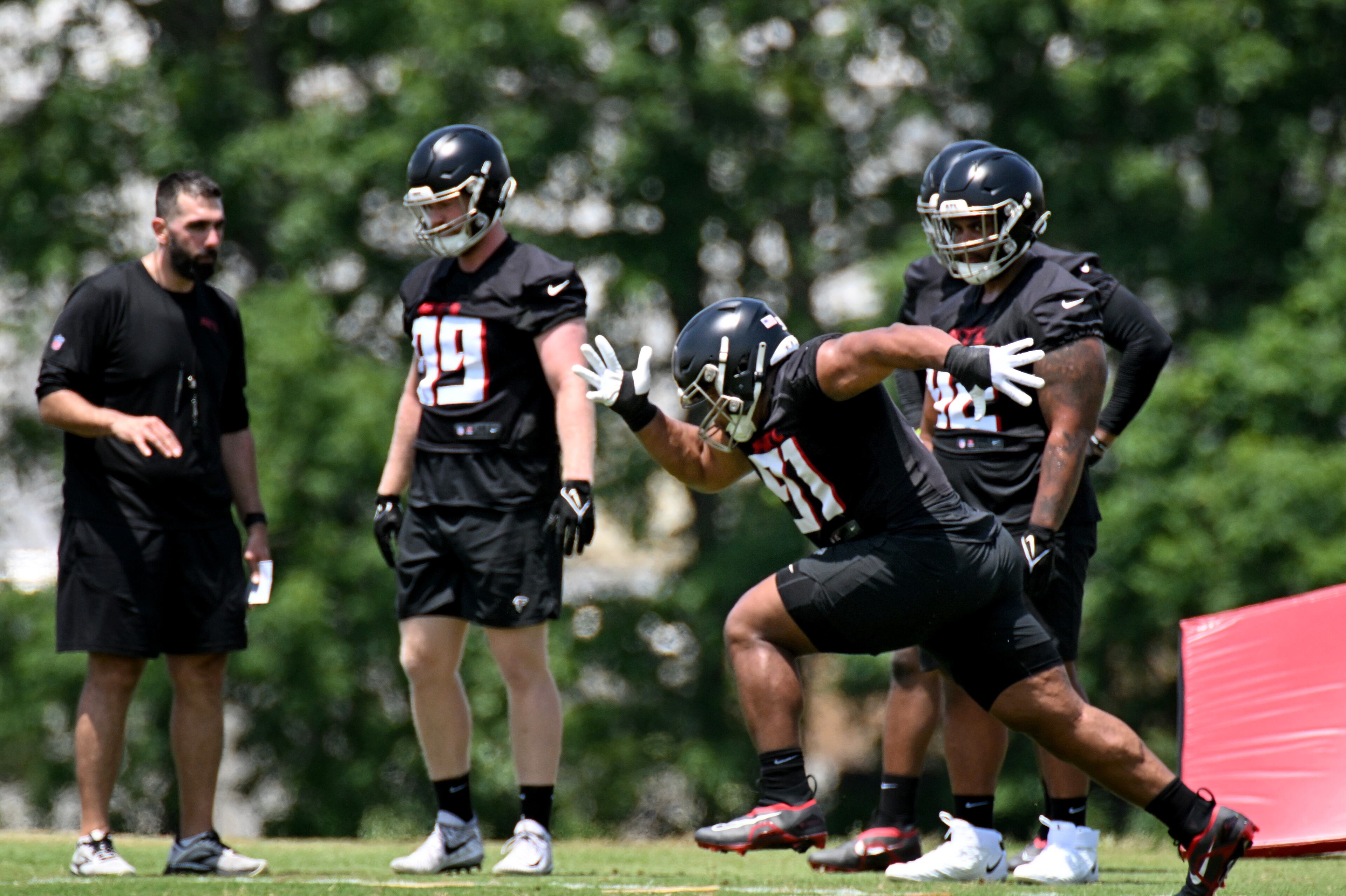 Atlanta Falcons DL Terry Hampton (91) runs a drill during Day 2 of Falcons rookie minicamp at Atlanta Falcons Training Facility, Saturday, May 13, 2023, in Flowery Branch. (Hyosub Shin / Hyosub.Shin@ajc.com)