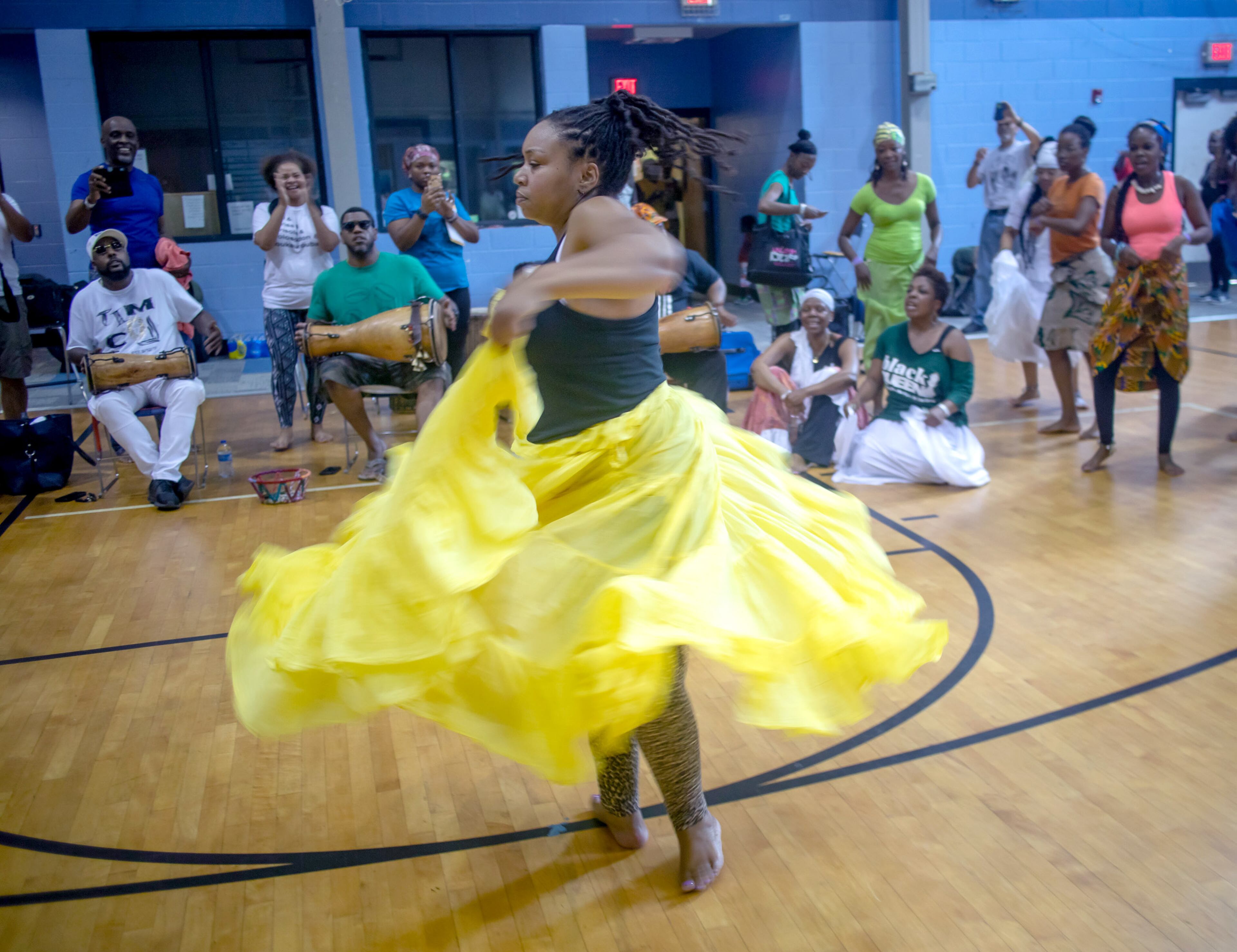 Students dance during an Afro-Cuban dance class at the 11th Atlanta African Dance & Drum Festival at the Covenant House of Georgia on Sunday, July 28, 2019. STEVE SCHAEFER / SPECIAL TO THE AJC