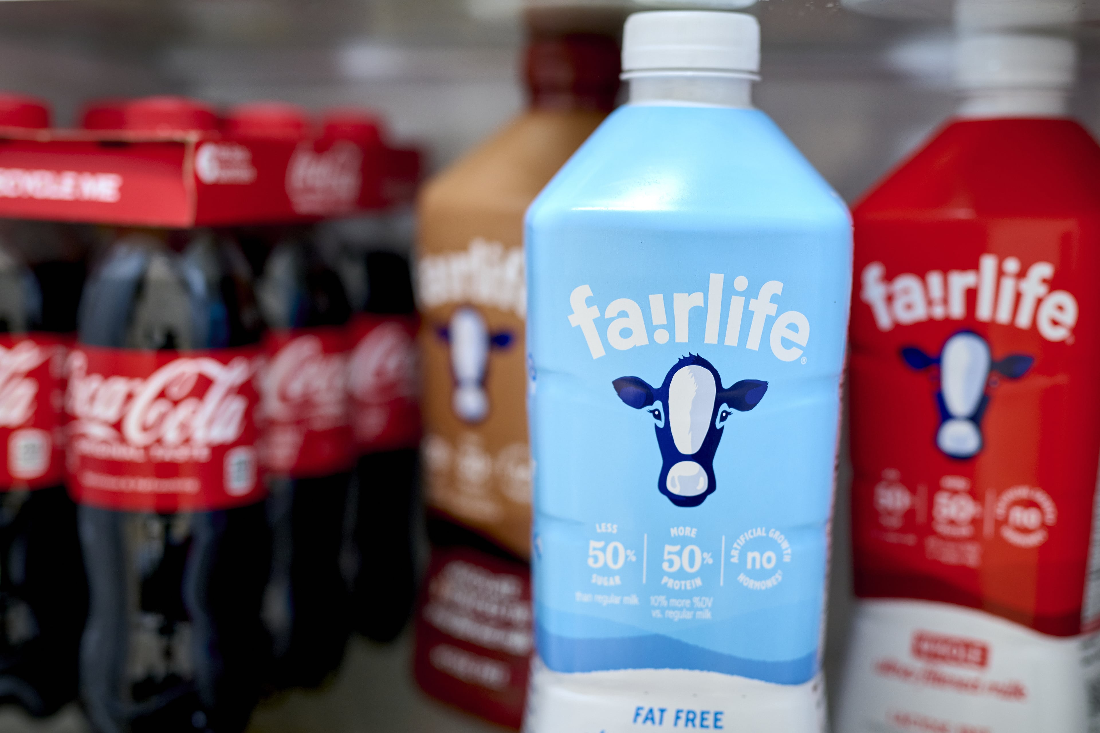Fairlife ultra-filtered fat free, whole and chocolate milk are displayed on a grocery shelf in Germantown, N.Y. Fairlife, which uses a specialized filtering process to boost protein and cut sugar and lactose in its milk products, helped spark the modern protein craze that's unfolded alongside the rise of Ozempic and other GLP-1 drugs. (Gabby Jones/Bloomberg via Getty Images 2024)