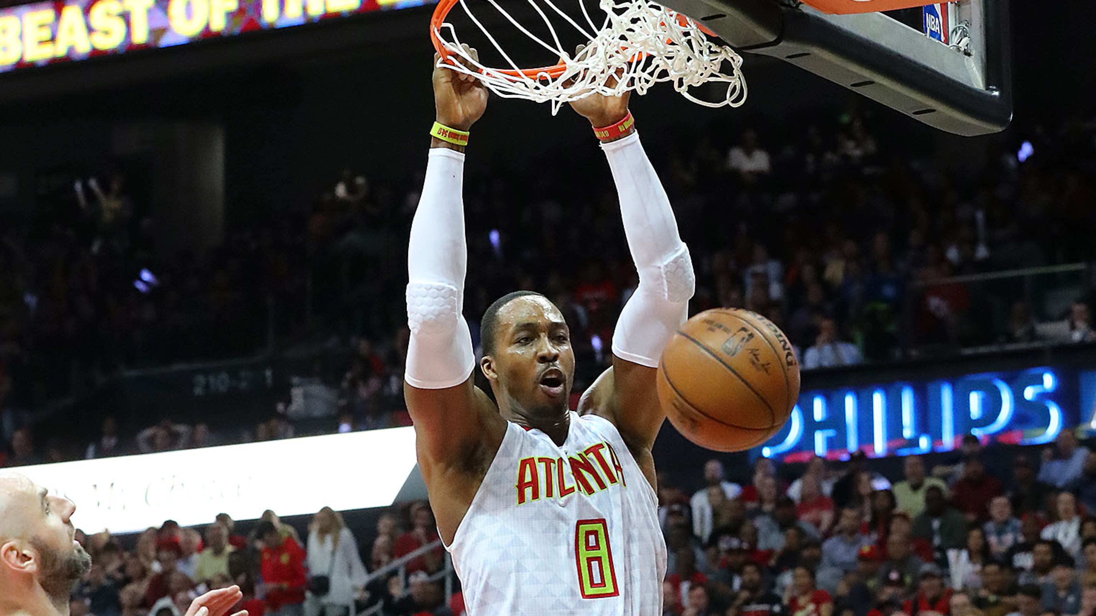 Atlanta Hawks’ Dwight Howard dunks over Washington Wizards Marcin Gortat in Game 4 of a first-round NBA basketball playoff series on Monday, April 24, 2017, in Atlanta. Curtis Compton/ccompton@ajc.com