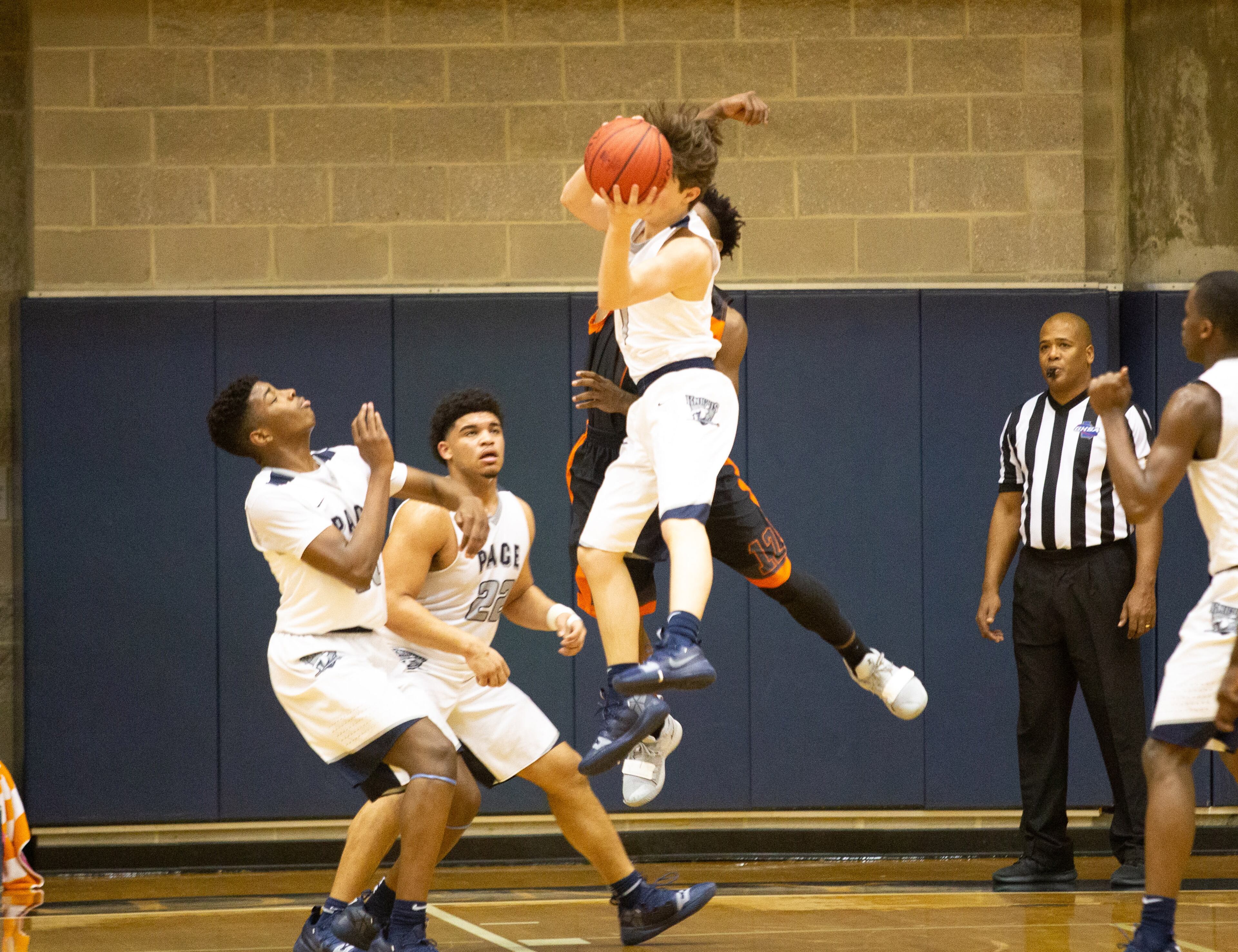 Pace Academy High School player Josh Mininberg fights for a rebound during Pace Knights game with Hart County High School Saturday, February 16, 2019. STEVE SCHAEFER / SPECIAL TO THE AJC