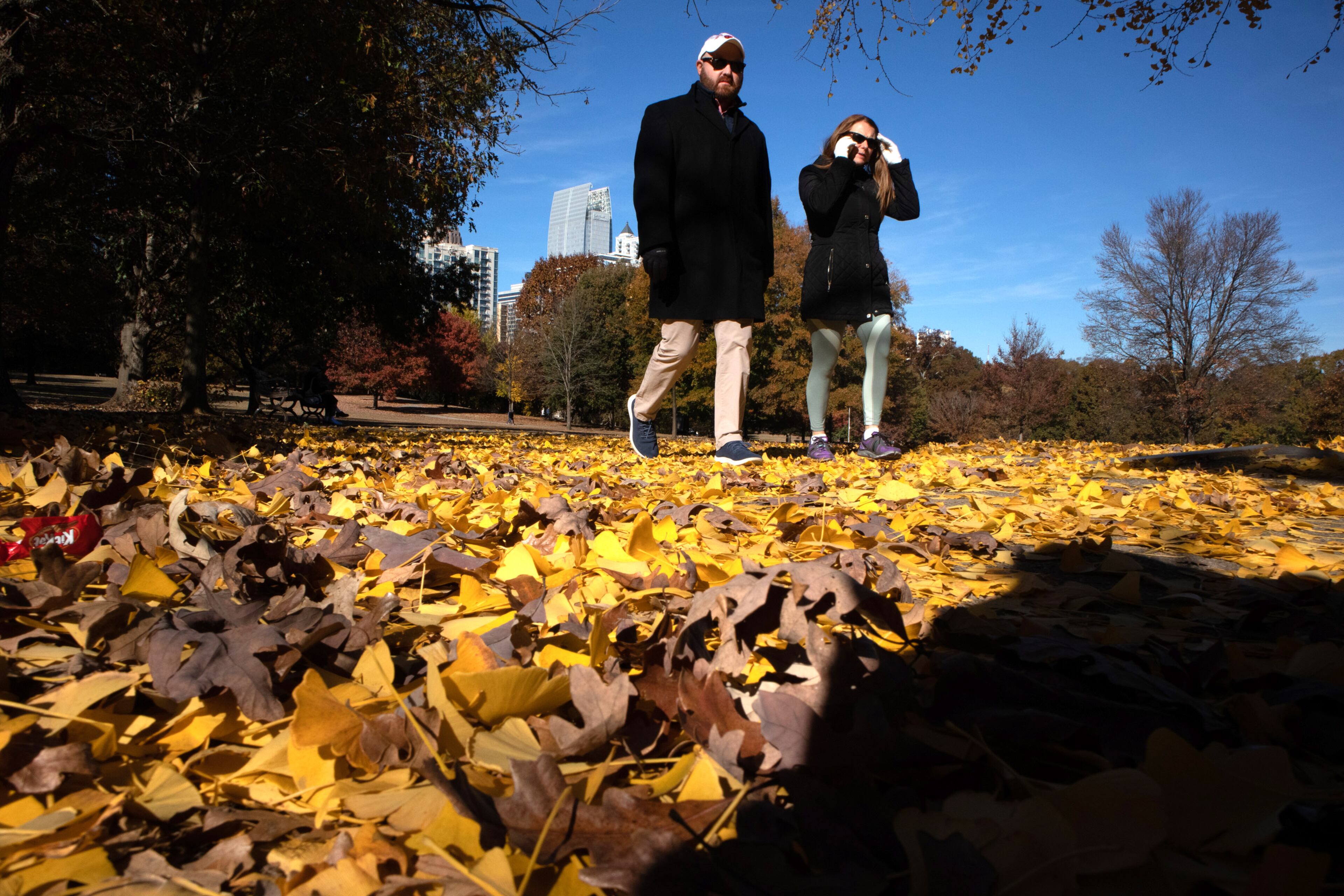 People take advantage of the cool crisp fall morning to walk around Piedmont Park on Saturday, November 20, 2021. STEVE SCHAEFER FOR THE ATLANTA JOURNAL-CONSTITUTION