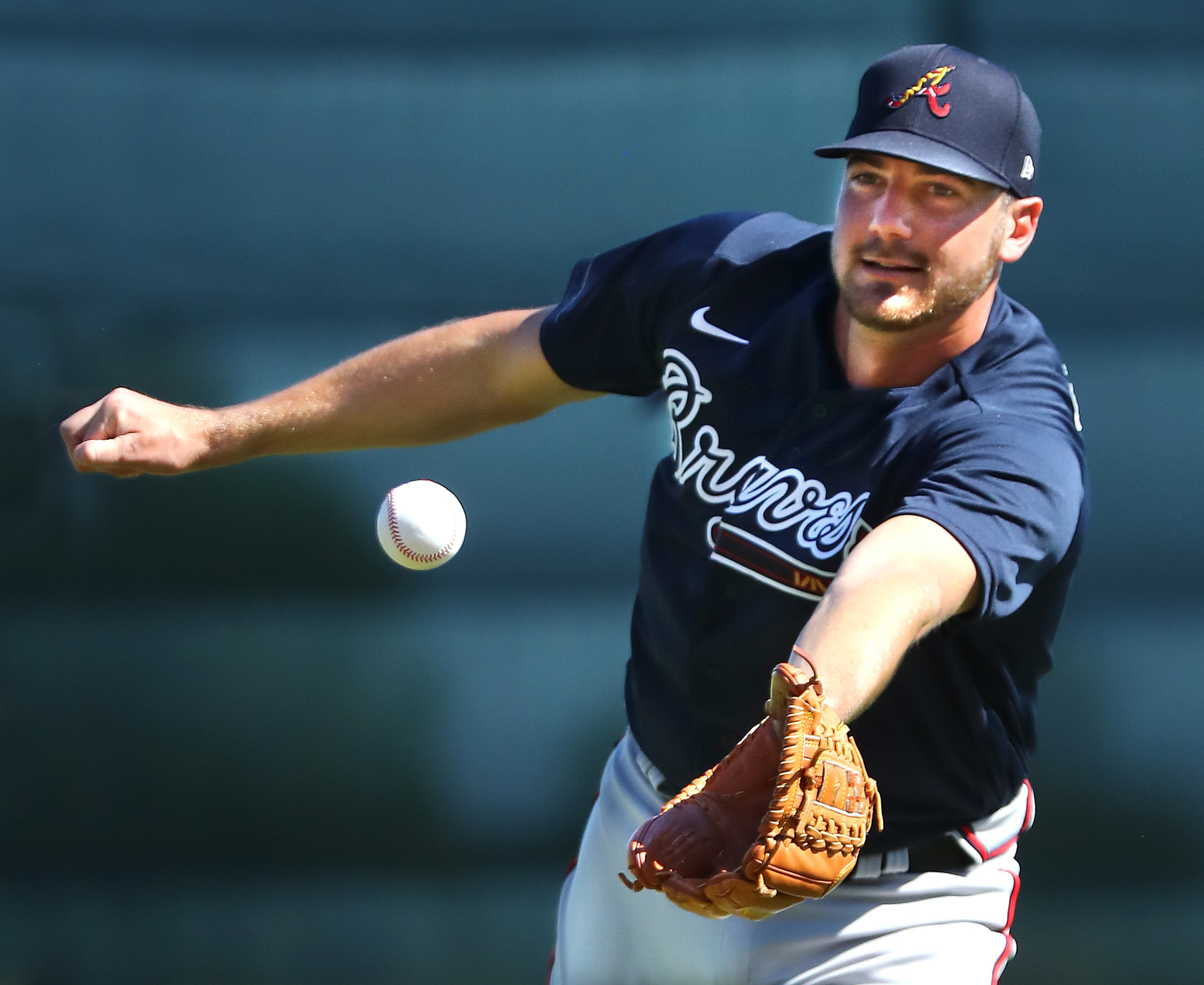 Braves pitcher Chad Sobotka comes off the mound to field a ground ball during spring training on Saturday, Feb. 15, 2020, in North Port. Curtis Compton ccompton@ajc.com