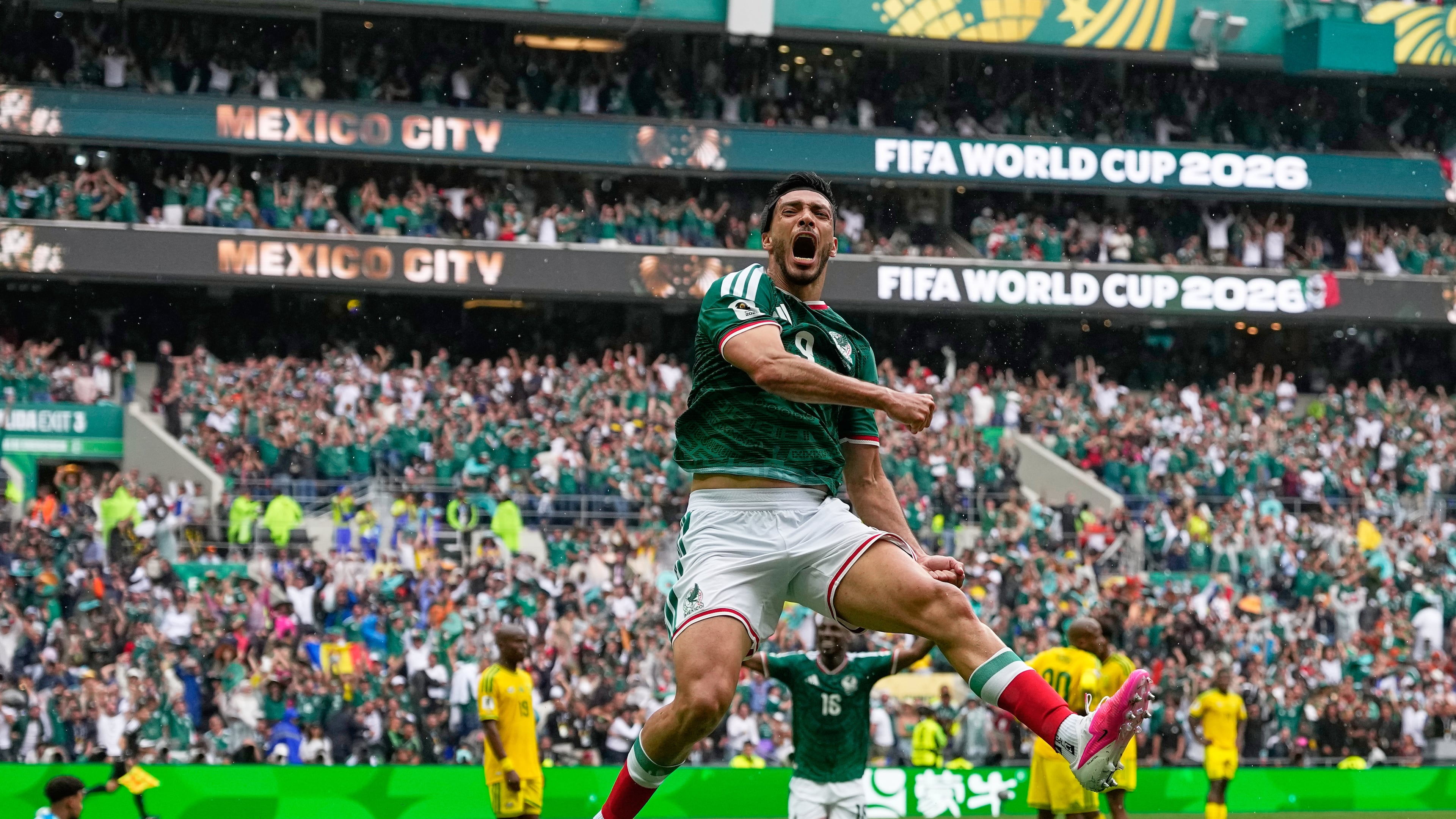 Mexico's Raul Jimenez celebrates after scoring his side's second goal during the World Cup Group A soccer match between Mexico and South Africa in Mexico City, Thursday, June 11, 2026. (AP Photo/Natacha Pisarenko)