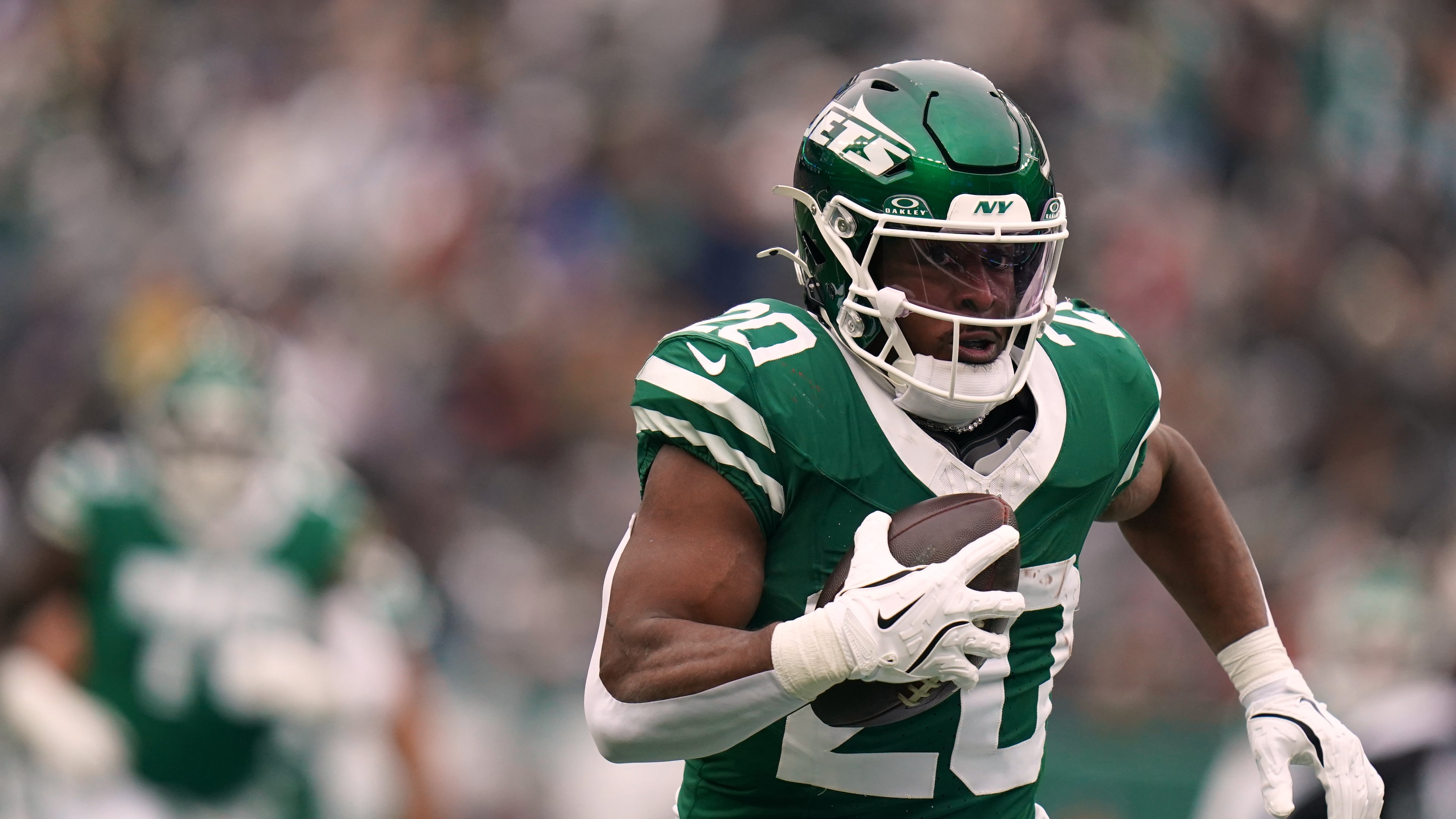FILE - New York Jets running back Breece Hall (20) carries the ball during an NFL football game against the New England Patriots, Dec. 28, 2025, in New York. (AP Photo/Vera Nieuwenhuis, File)