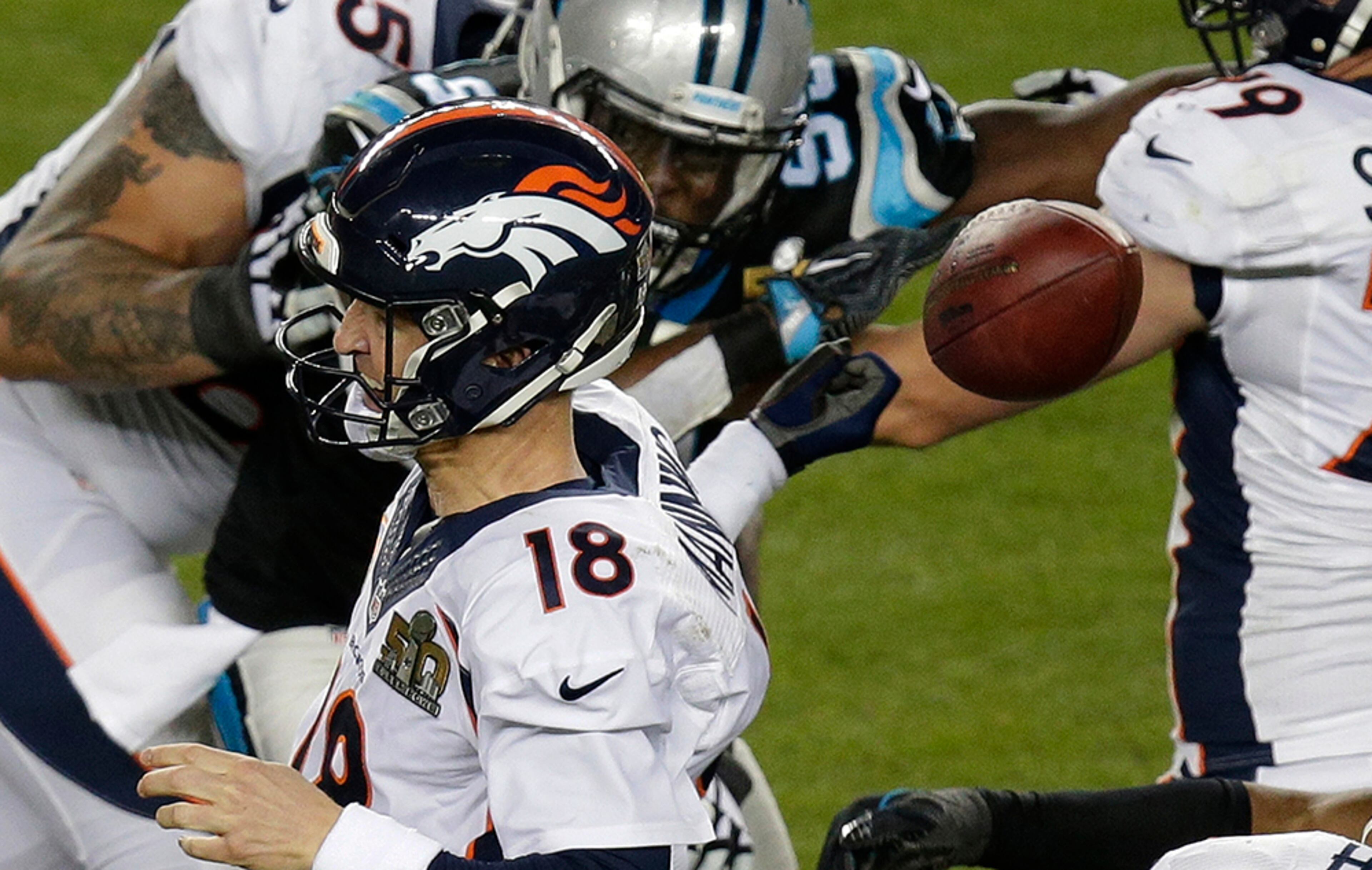 Denver Broncos quarterback Peyton Manning (18) loses the ball during the second half of Super Bowl 50 against the Carolina Panthers Sunday, Feb. 7, 2016, in Santa Clara, Calif. The Panthers recovered the fumble.