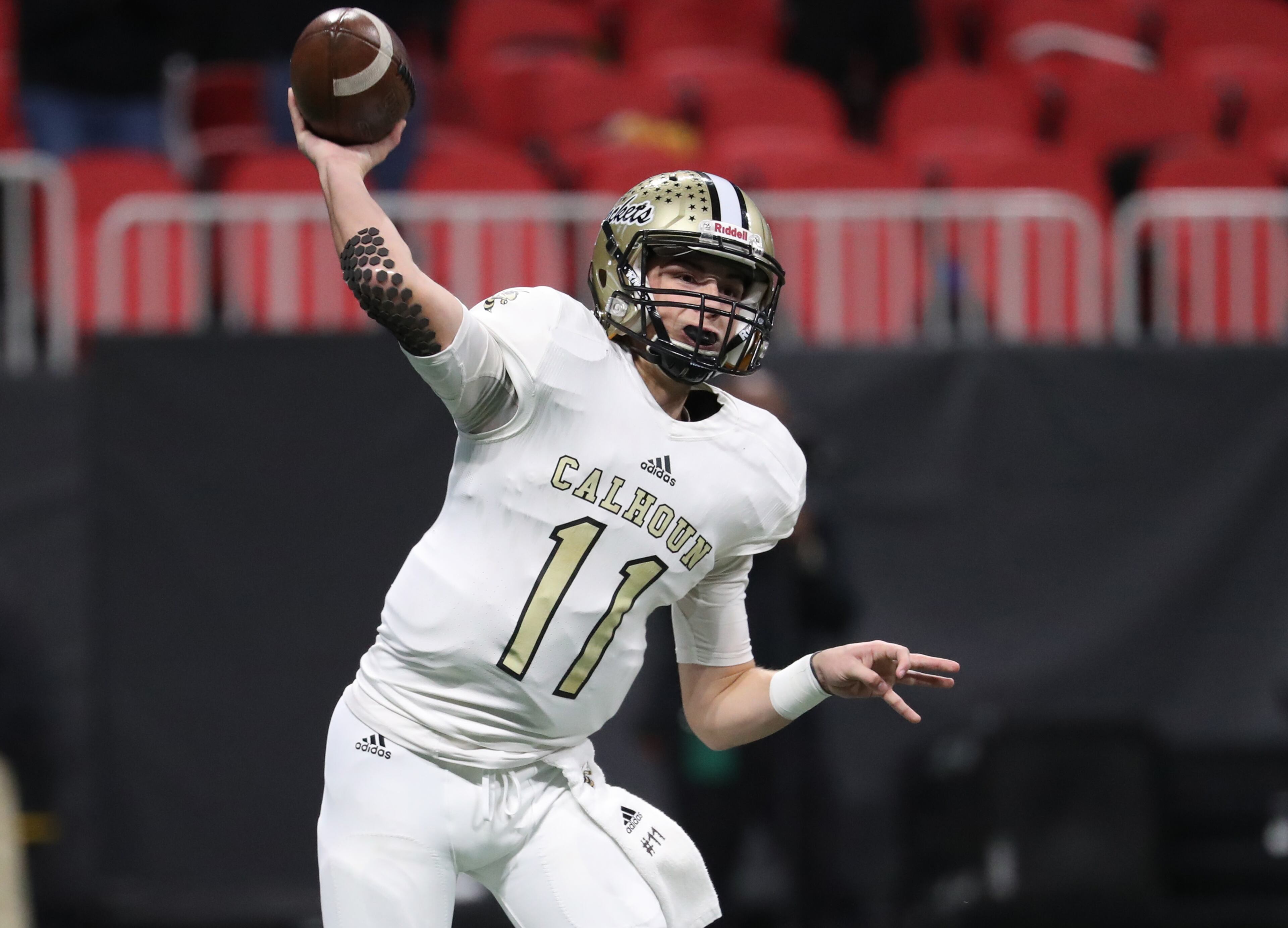 Calhoun quarterback Gavin Gray (11) attempts a pass in the first half of their game against Peach County during the Class AAA Championship at Mercedes-Benz Stadium Friday, December 8, 2017, in Atlanta. PHOTO / JASON GETZ