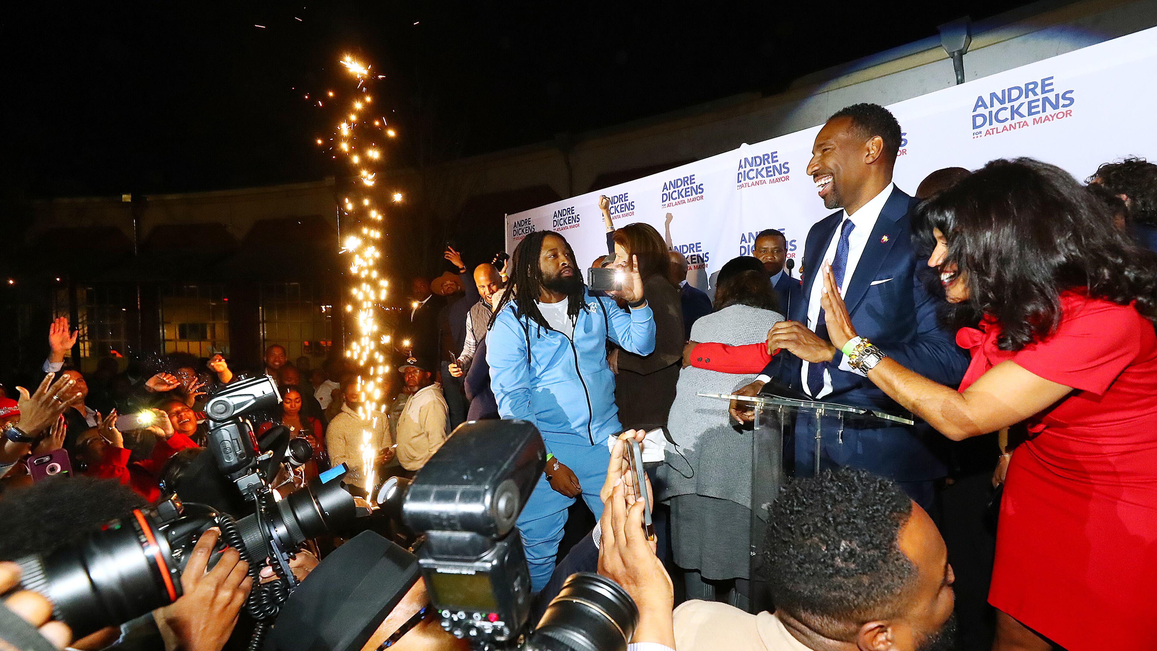 Flares go off as Atlanta Mayor-elect Andre Dickens concludes his victory address at his election night watch party on Tuesday, Nov. 30. Curtis Compton / Curtis.Compton@ajc.com