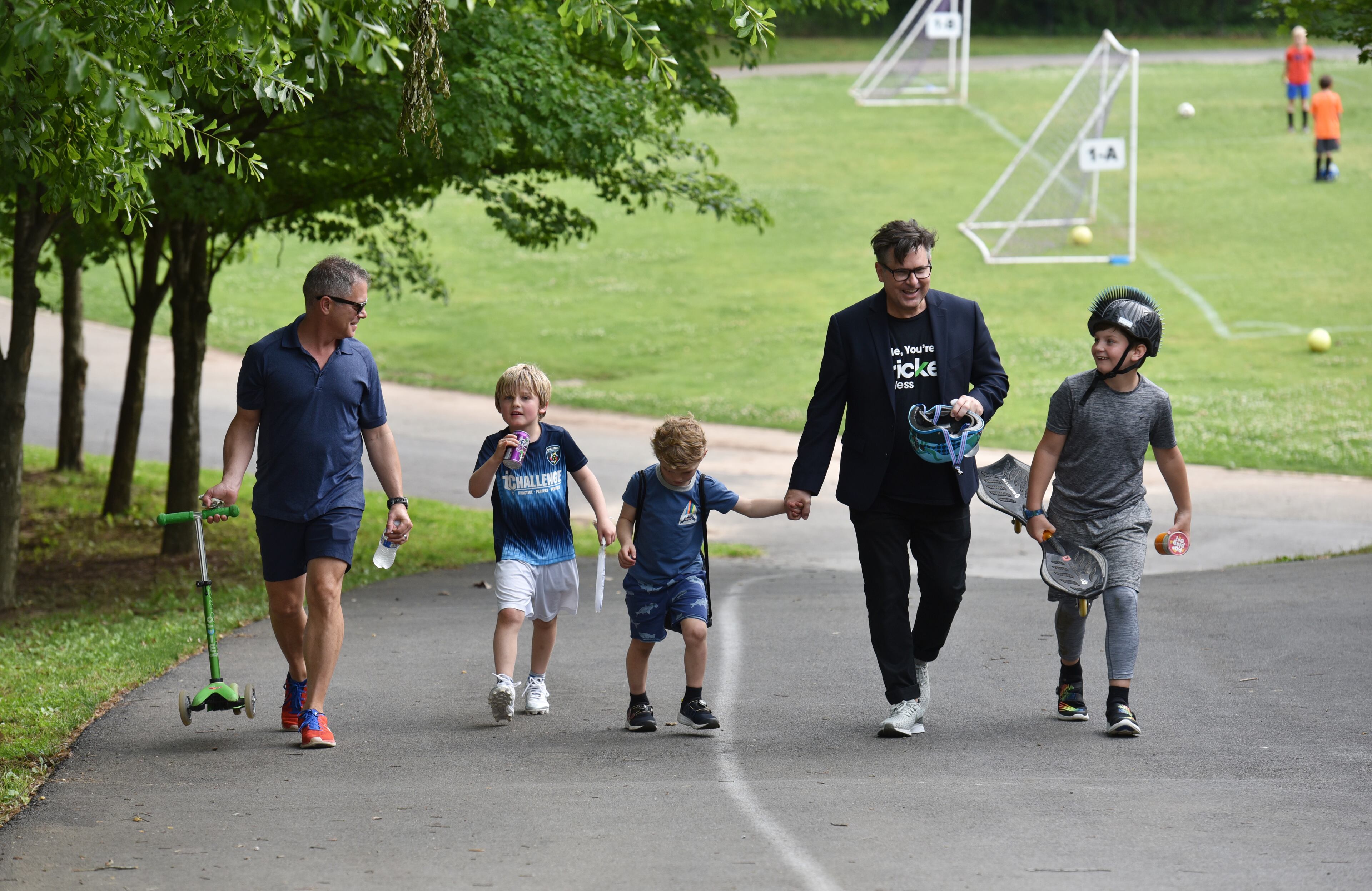 April 25, 2019 Atlanta - Matthew Simon, and Keith Schumann with their sons Hunter, 6, Owen, 4, and Jackson, 10, after soccer practice. HYOSUB SHIN / HSHIN@AJC.COM
