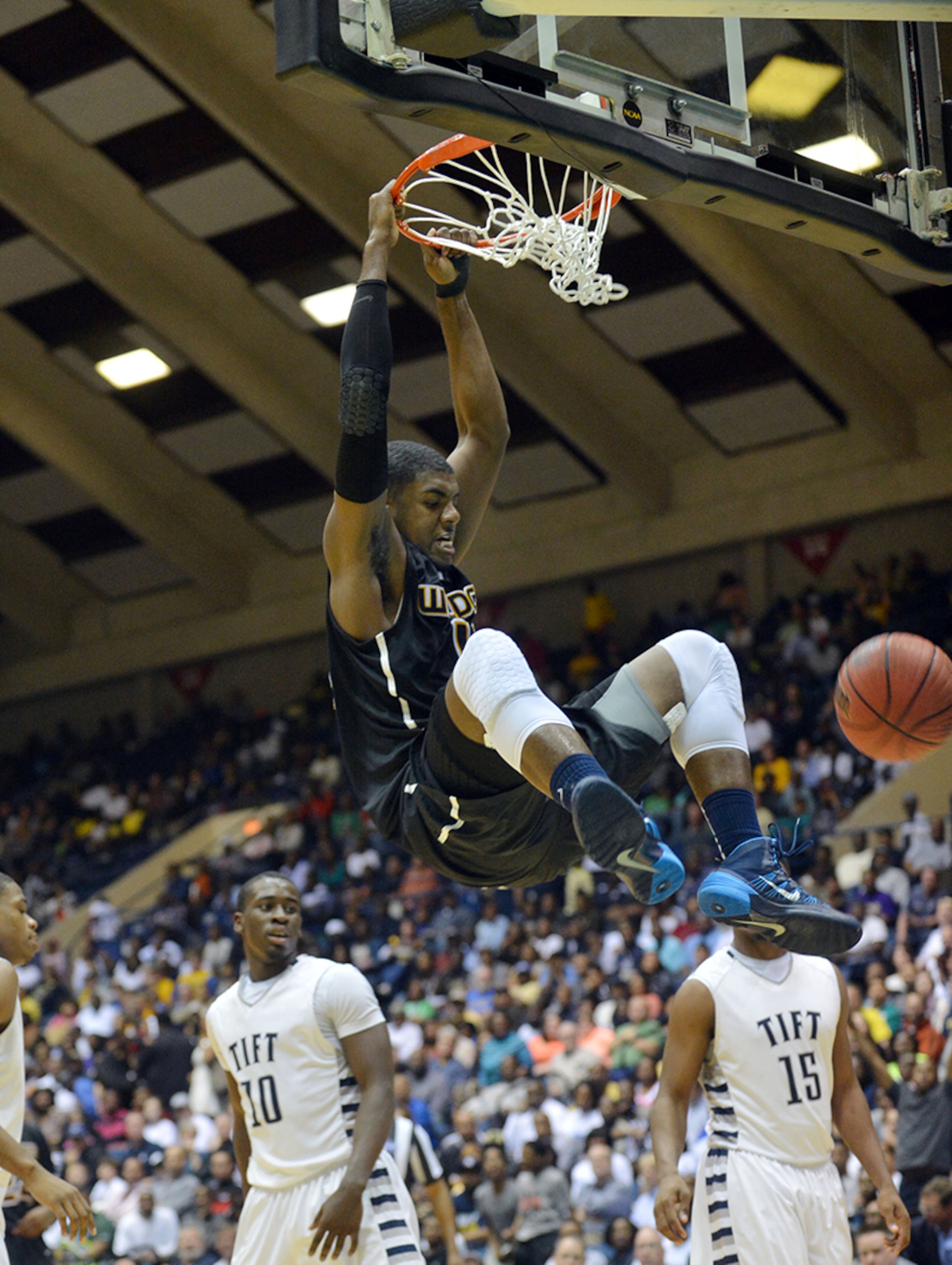 Wheeler's Elijah Staley (14) slams one home. The Blue Devils won the Class AAAAAA over the Wildcats, 63-49, Saturday, March 8, 2014, in Macon.