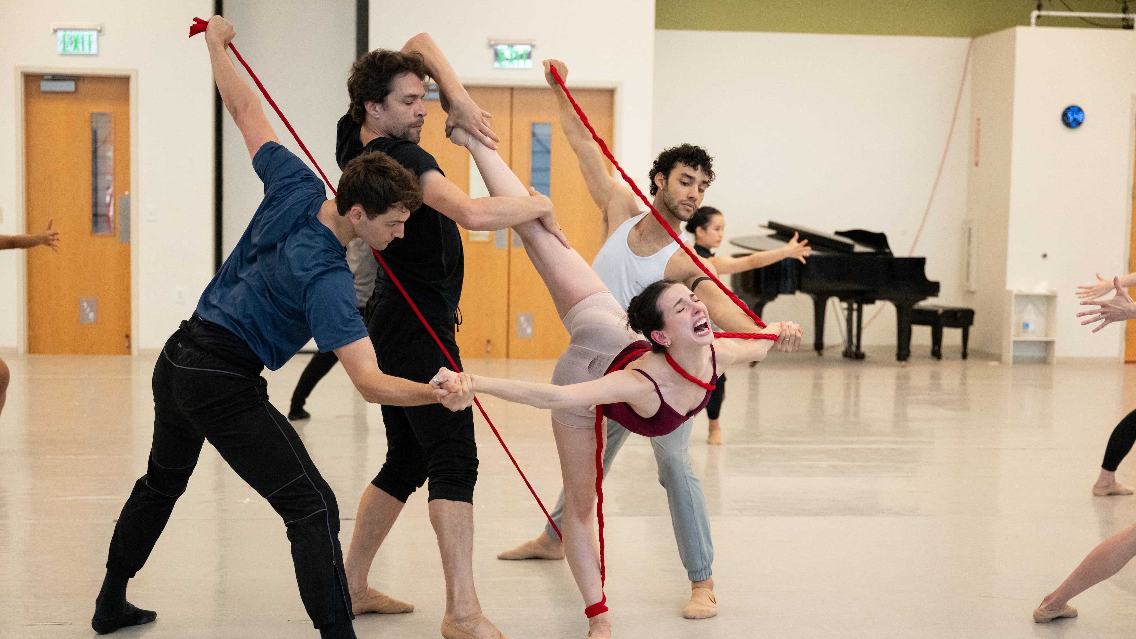 Playing Frida Kahlo, Larissa Capitanio Dal'Santo (center) rehearses with fellow Atlanta Ballet dancers before this weekend's debut of "Frida" at Cobb Energy Performing Arts Centre. (Courtesy of Shoccara Marcus)