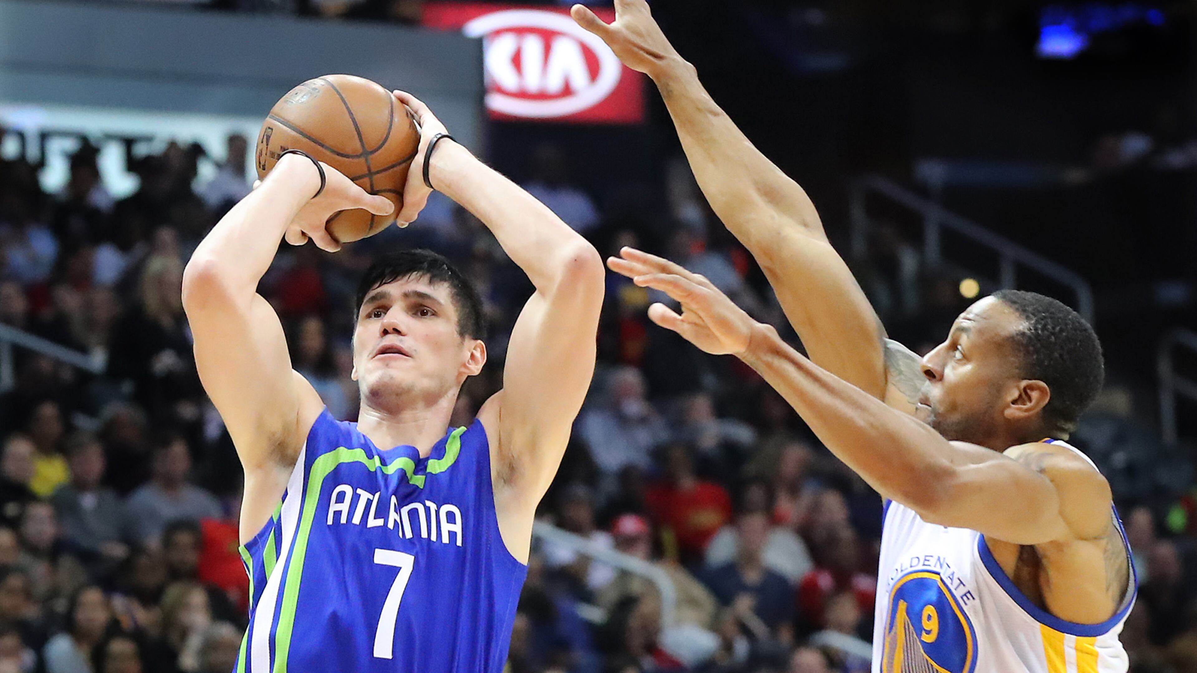 Atlanta Hawks Ersan Ilyasova shoots for two against Golden State Warriors Andre Iguodala during the second period in a NBA basketball game on Monday, March 6, 2017, in Atlanta. Curtis Compton/ccompton@ajc.com